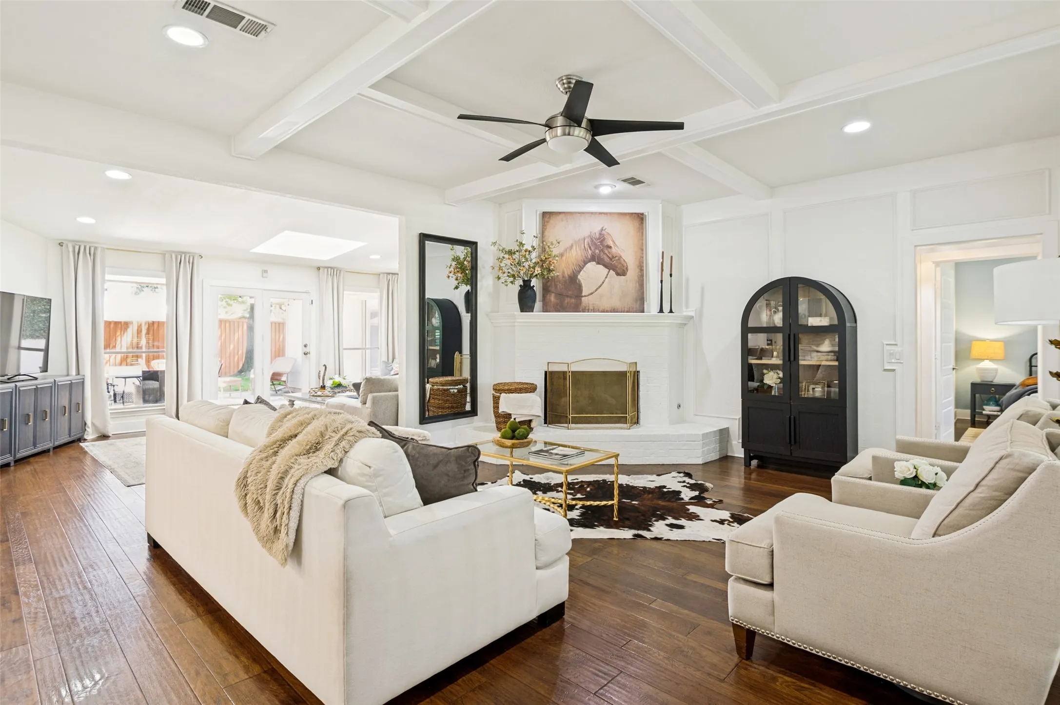 Open floor plan with two living areas open to kitchen