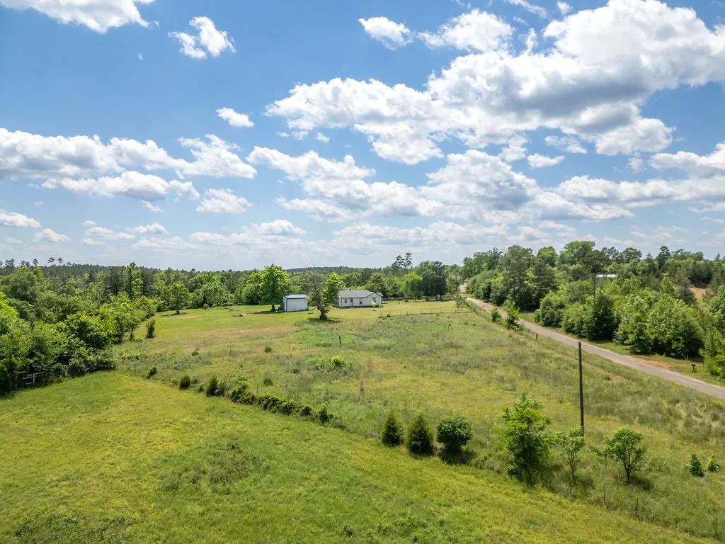 Single Family Residence For Sale in Cass County , 8869 County Road 1617, Avinger, Texas 75630, 2 Bedrooms, 1 Bathroom, Garage spaces, 1,136 Sqft, built in 1940, Price $212,000, mls#21310637, Real Estate Agent in Avinger, Homes For Sale in Cass county, Homes For Sale in Avinger, Realtor in Avinger Texas, Real Estate Brokerage Independent Realty Texas, Luminita Cordes Realtor