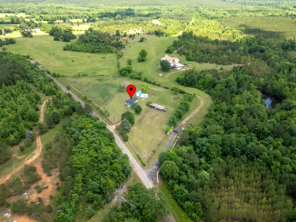 Single Family Residence For Sale in Cass County , 8869 County Road 1617, Avinger, Texas 75630, 2 Bedrooms, 1 Bathroom, Garage spaces, 1,136 Sqft, built in 1940, Price $212,000, mls#21310637, Real Estate Agent in Avinger, Homes For Sale in Cass county, Homes For Sale in Avinger, Realtor in Avinger Texas, Real Estate Brokerage Independent Realty Texas, Luminita Cordes Realtor