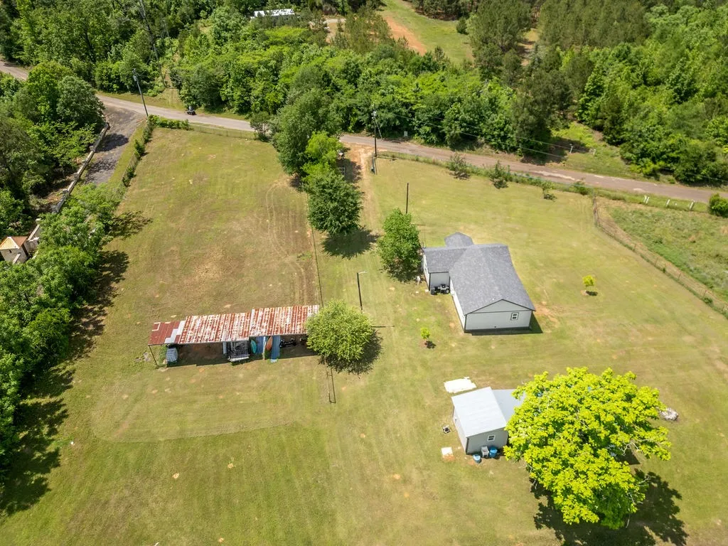 Single Family Residence For Sale in Cass County , 8869 County Road 1617, Avinger, Texas 75630, 2 Bedrooms, 1 Bathroom, Garage spaces, 1,136 Sqft, built in 1940, Price $212,000, mls#21310637, Real Estate Agent in Avinger, Homes For Sale in Cass county, Homes For Sale in Avinger, Realtor in Avinger Texas, Real Estate Brokerage Independent Realty Texas, Luminita Cordes Realtor