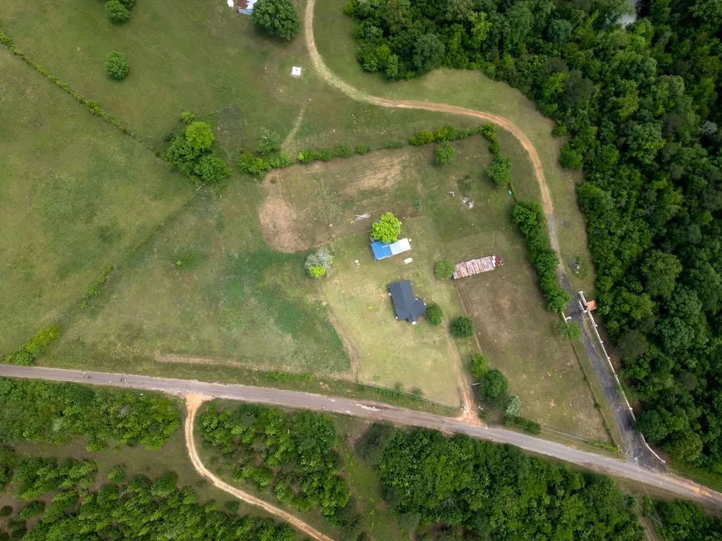 Single Family Residence For Sale in Cass County , 8869 County Road 1617, Avinger, Texas 75630, 2 Bedrooms, 1 Bathroom, Garage spaces, 1,136 Sqft, built in 1940, Price $212,000, mls#21310637, Real Estate Agent in Avinger, Homes For Sale in Cass county, Homes For Sale in Avinger, Realtor in Avinger Texas, Real Estate Brokerage Independent Realty Texas, Luminita Cordes Realtor