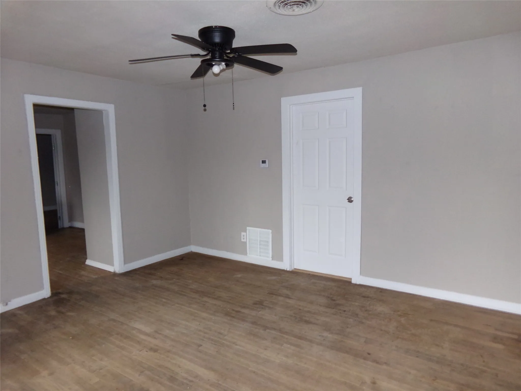 Neutral tone wall paint with crisp white trim throughout