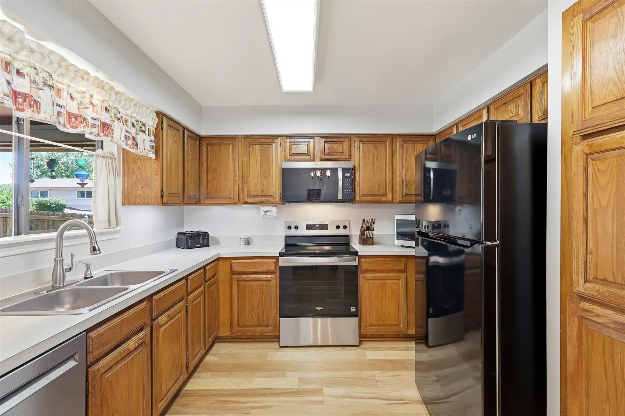 Lots of counter space with new oven and new microwave.