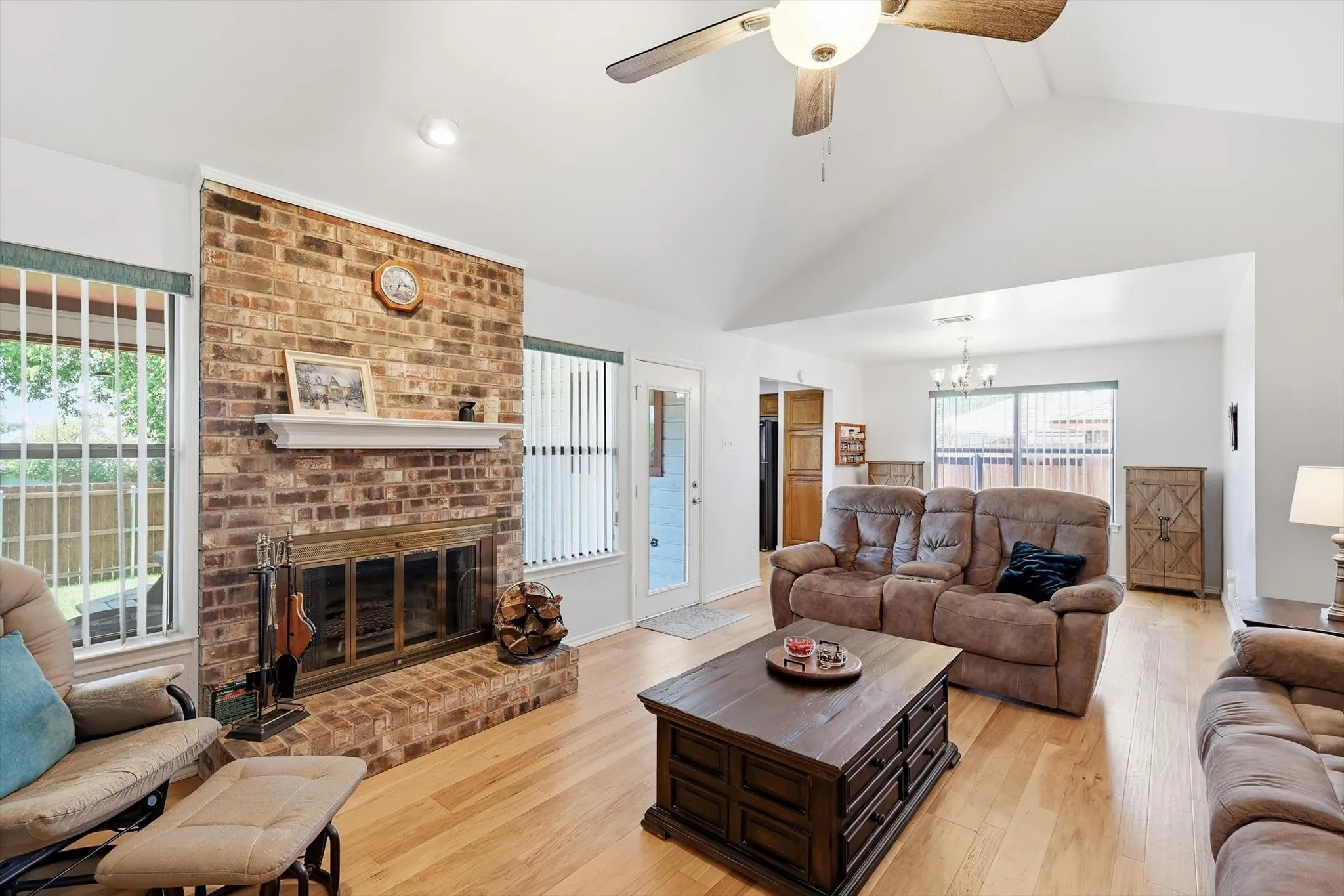 Spacious living area with lots of windows and natural light!