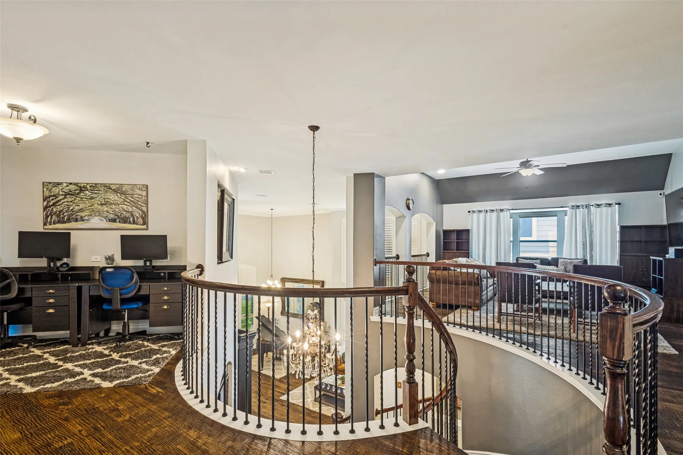 Upstairs hallway with loft to the right and study area on the left.