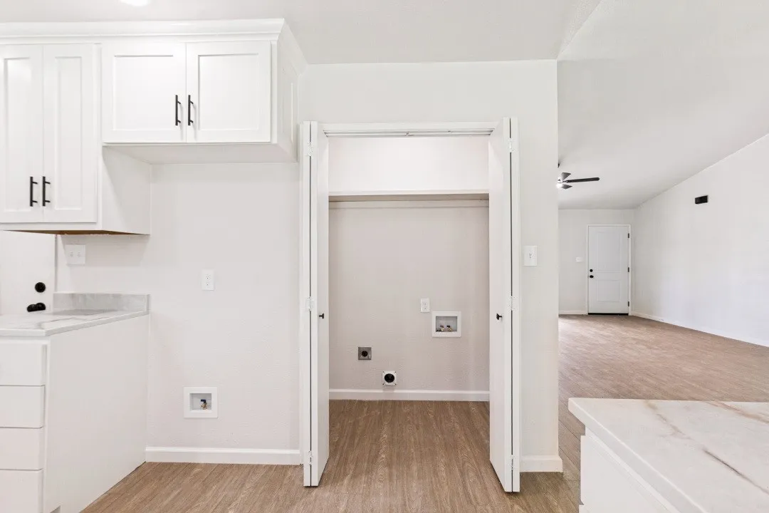 MUST HAVE - LAUNDRY ROOM INSIDE AND NOT IN THE GARAGE.