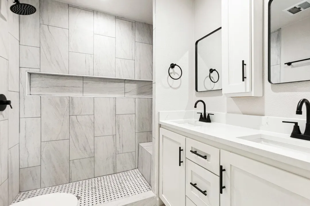WOW!  THIS MASTER BATH IS AMAZING!  TWO SINKS, WALK-IN SHOWER WITH SEAT, SOFT CLOSE DRAWERS, LINEN CLOSET.
