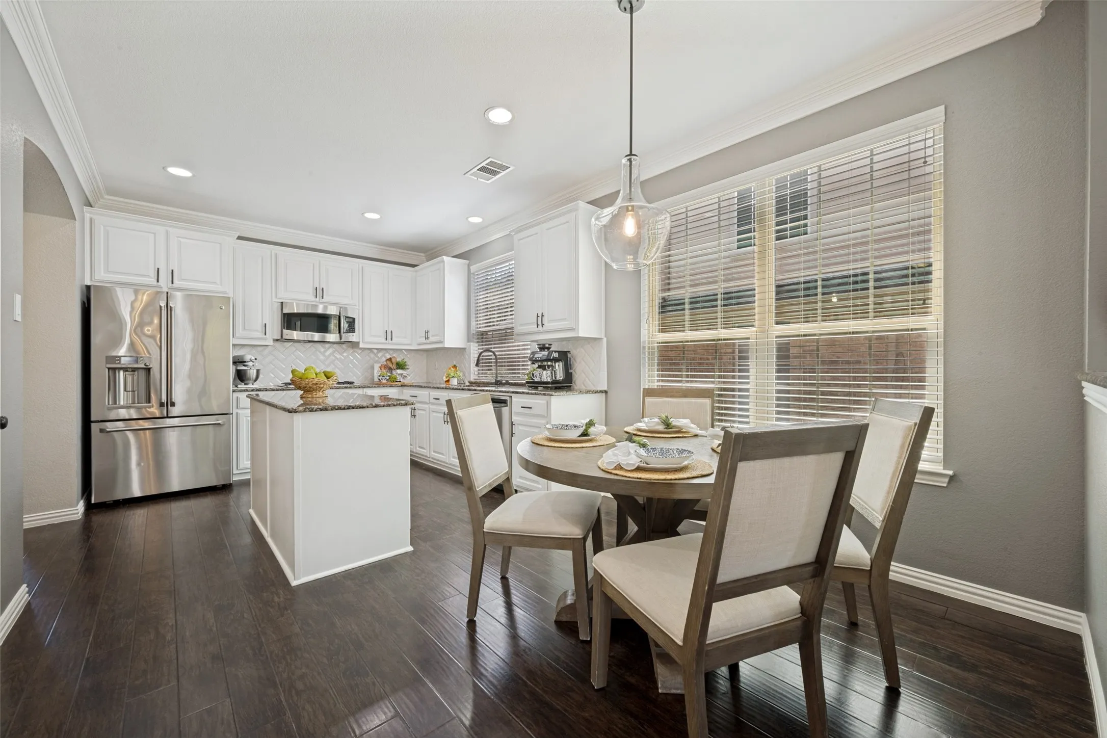 Updated and upgraded kitchen, triple stack molding, wood floors. Granite, SS Appliances, Convection Oven, 60/40 double bowl sink, 12"deep at 60.