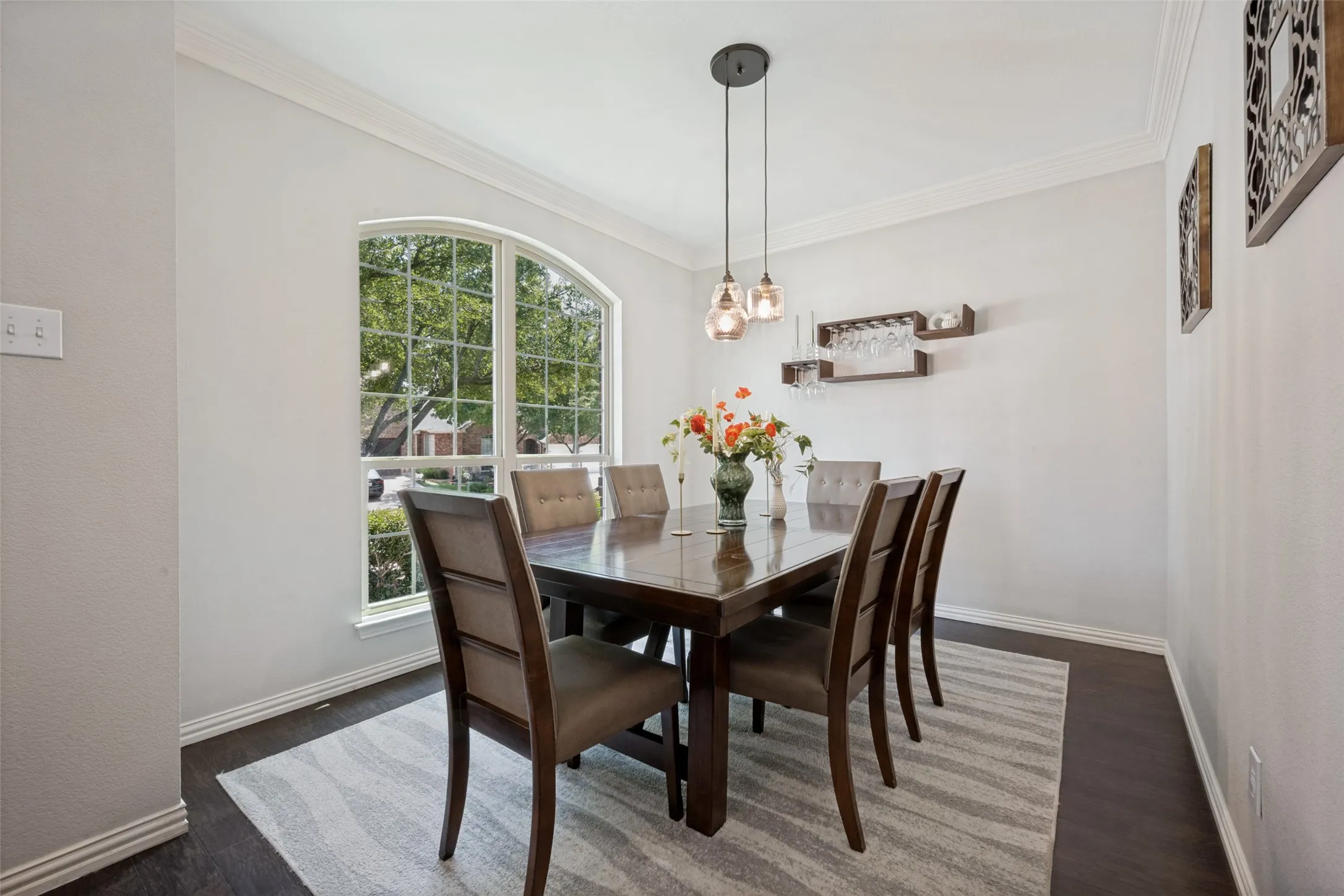 Triple stack mouldings, wood floors, nicely painted, floor to ceiling windows, beautiful updates