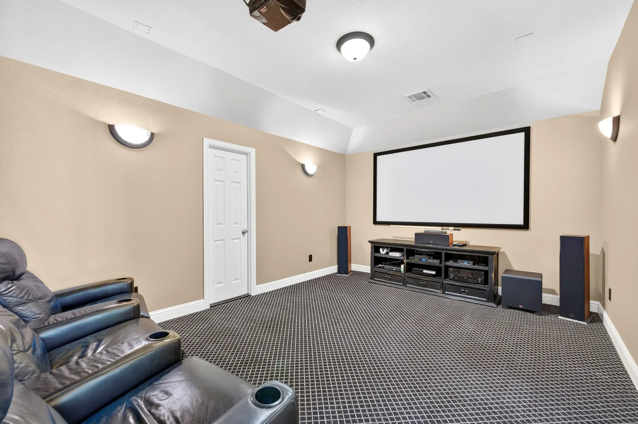 Since the media system, furniture, and X-Box convey, you can start enjoying this media room from Day 1.  There's even a special storage closet!