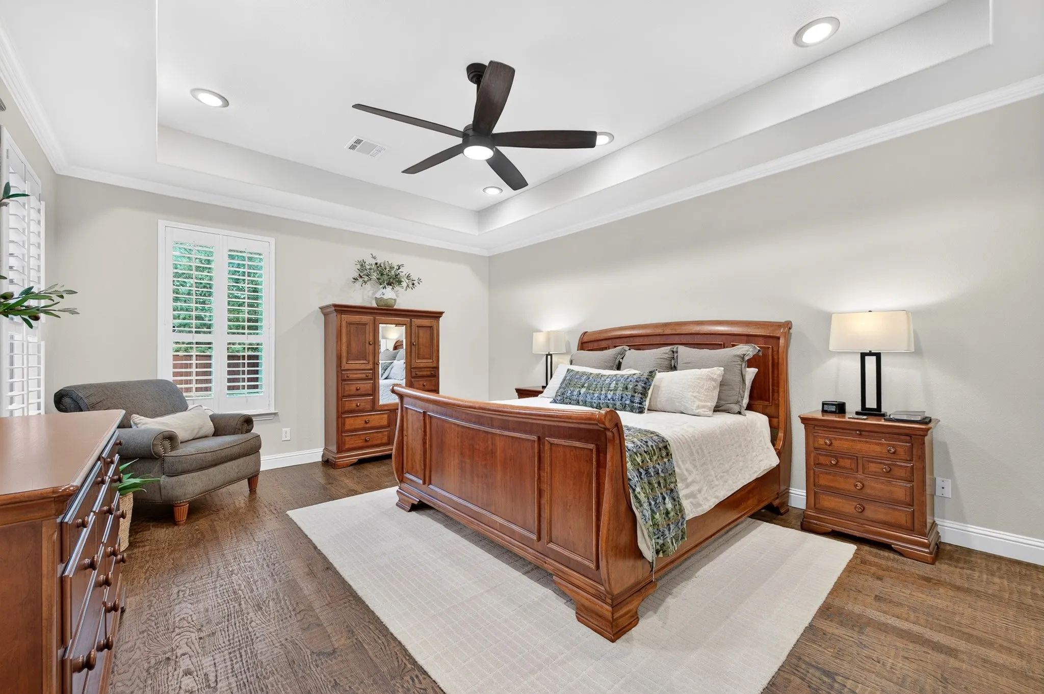 Enjoy the serenity of this large bedroom.