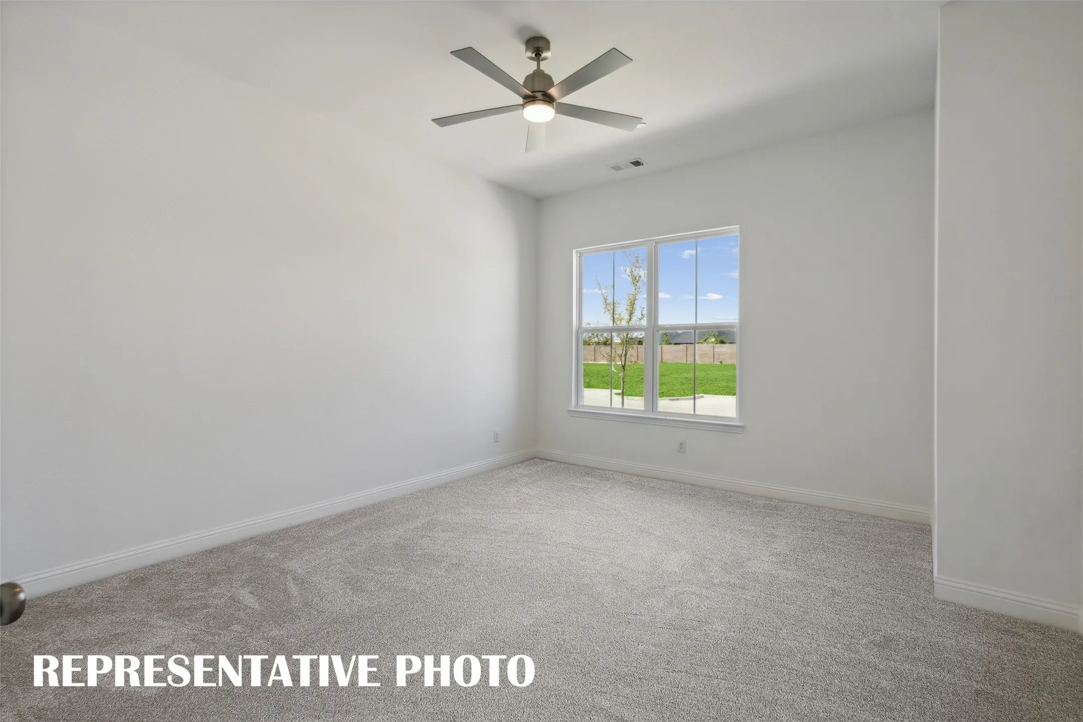 This peaceful and relaxing, main floor owner's bedroom is the perfect place for you to relax and unwind at the end of the day.