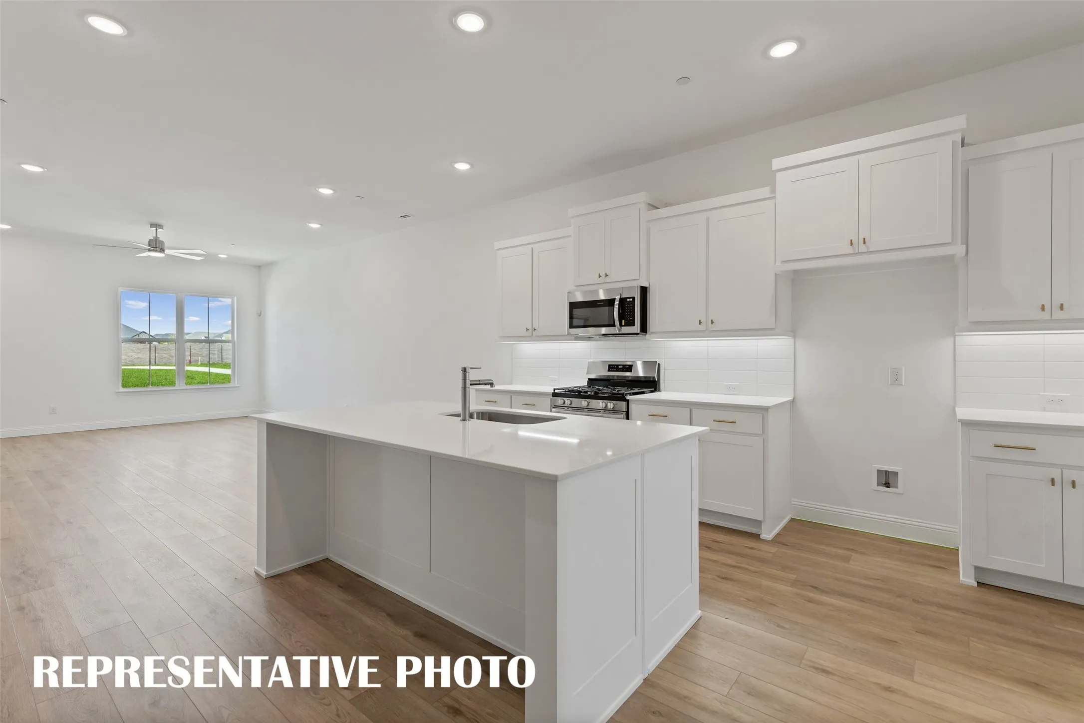 The chef will never be left out of the party in this open concept dream home!