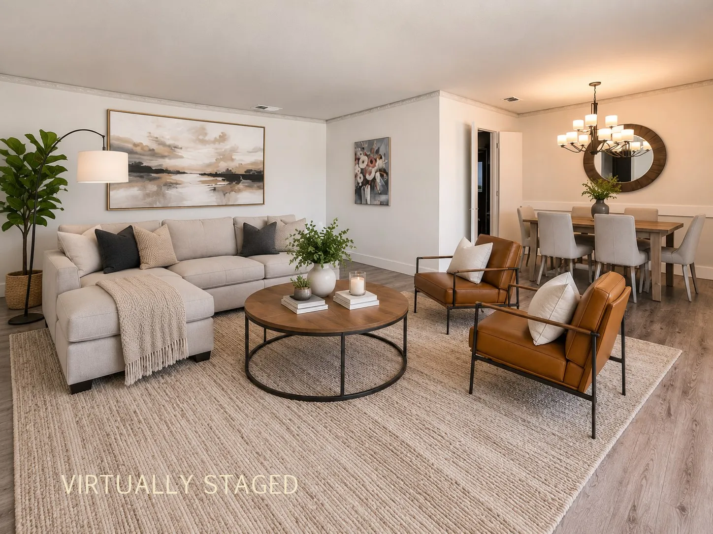 Open-concept living space featuring wood-finish flooring, recessed lighting, and a neutral color palette