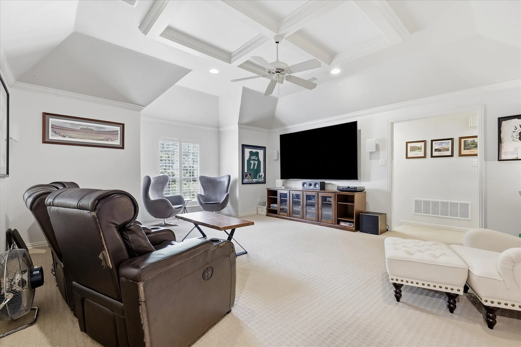 Huge game room up with built-ins & storage.
