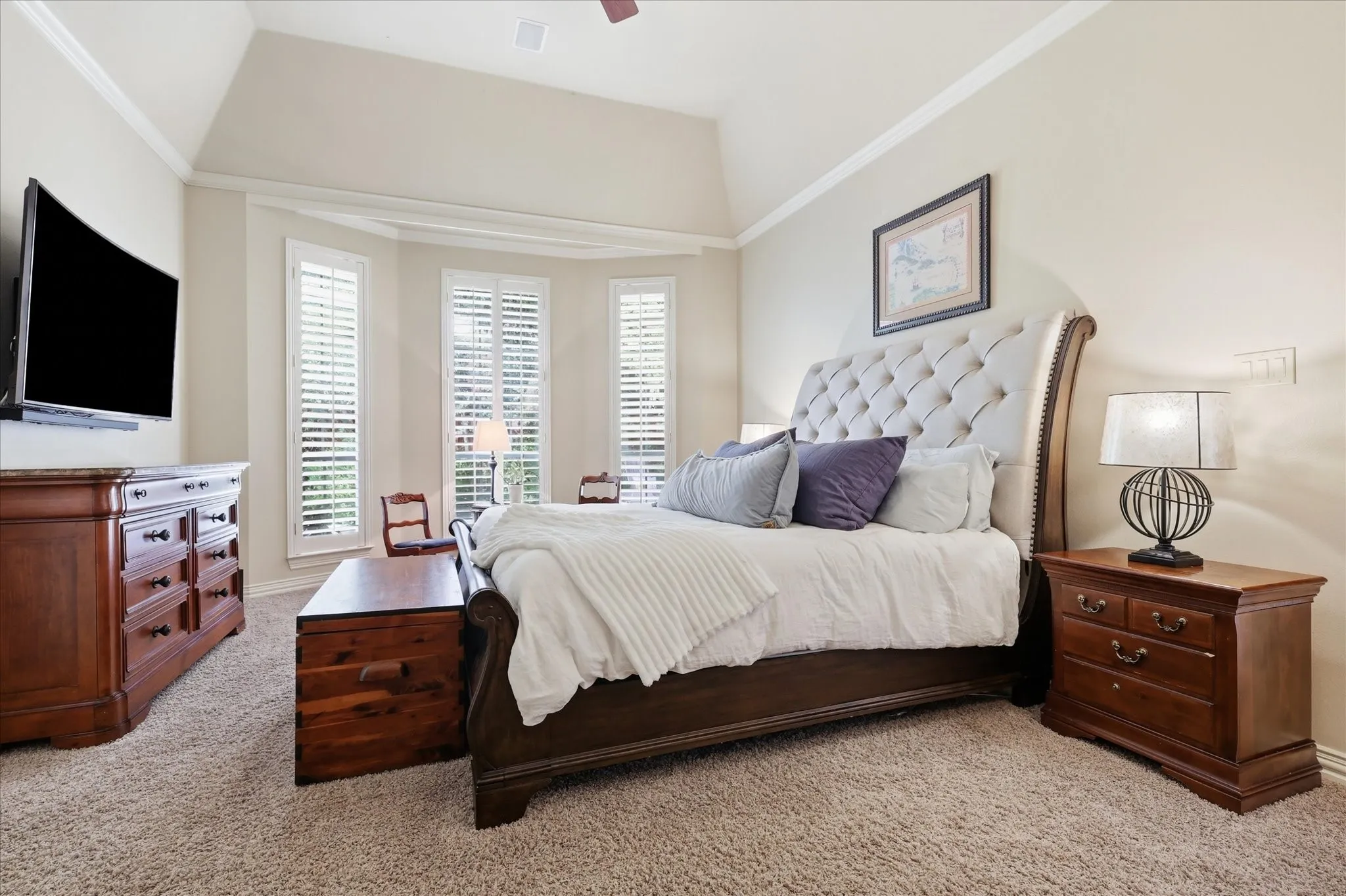Main Br is split down for privacy & has a bay window sitting area.