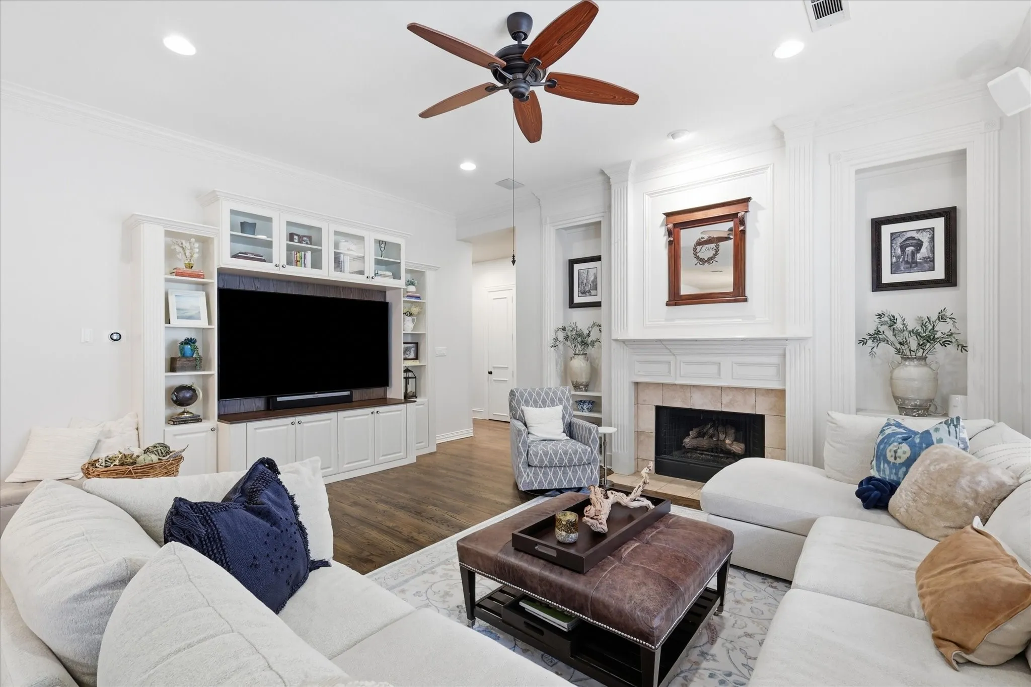 Open light & bright living Room with bay window, WBFP & built-ins.
