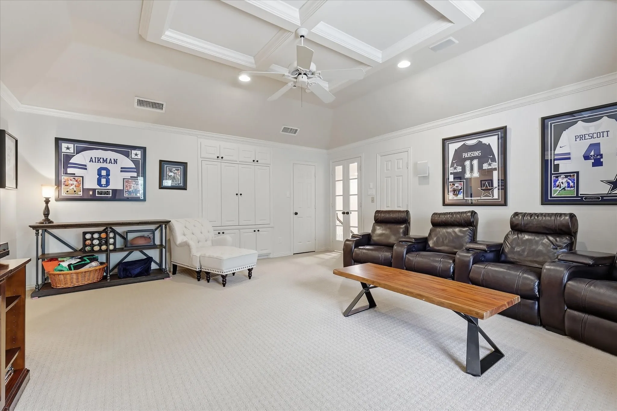 Huge game room up with built-ins & storage.