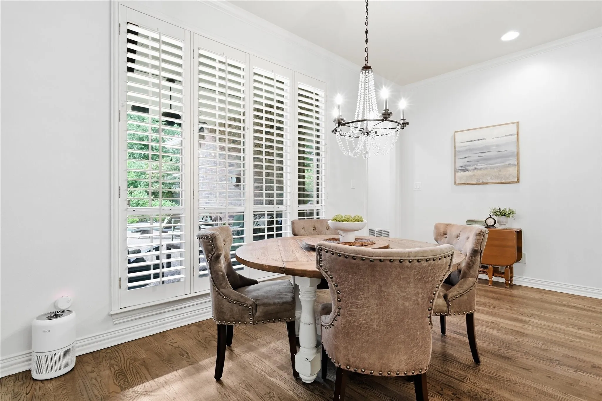 Breakfast area  views the lush back yard & is open to the kit & Liv areas.