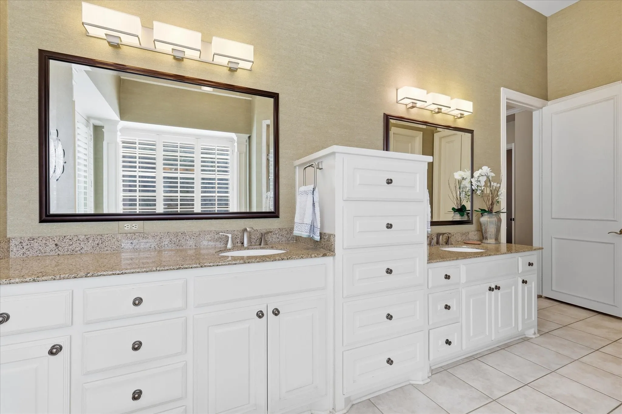 Ensuite bath has dual vanities, large jetted garden tub, walk-in shower & walk-in closet. Plenty of storage!