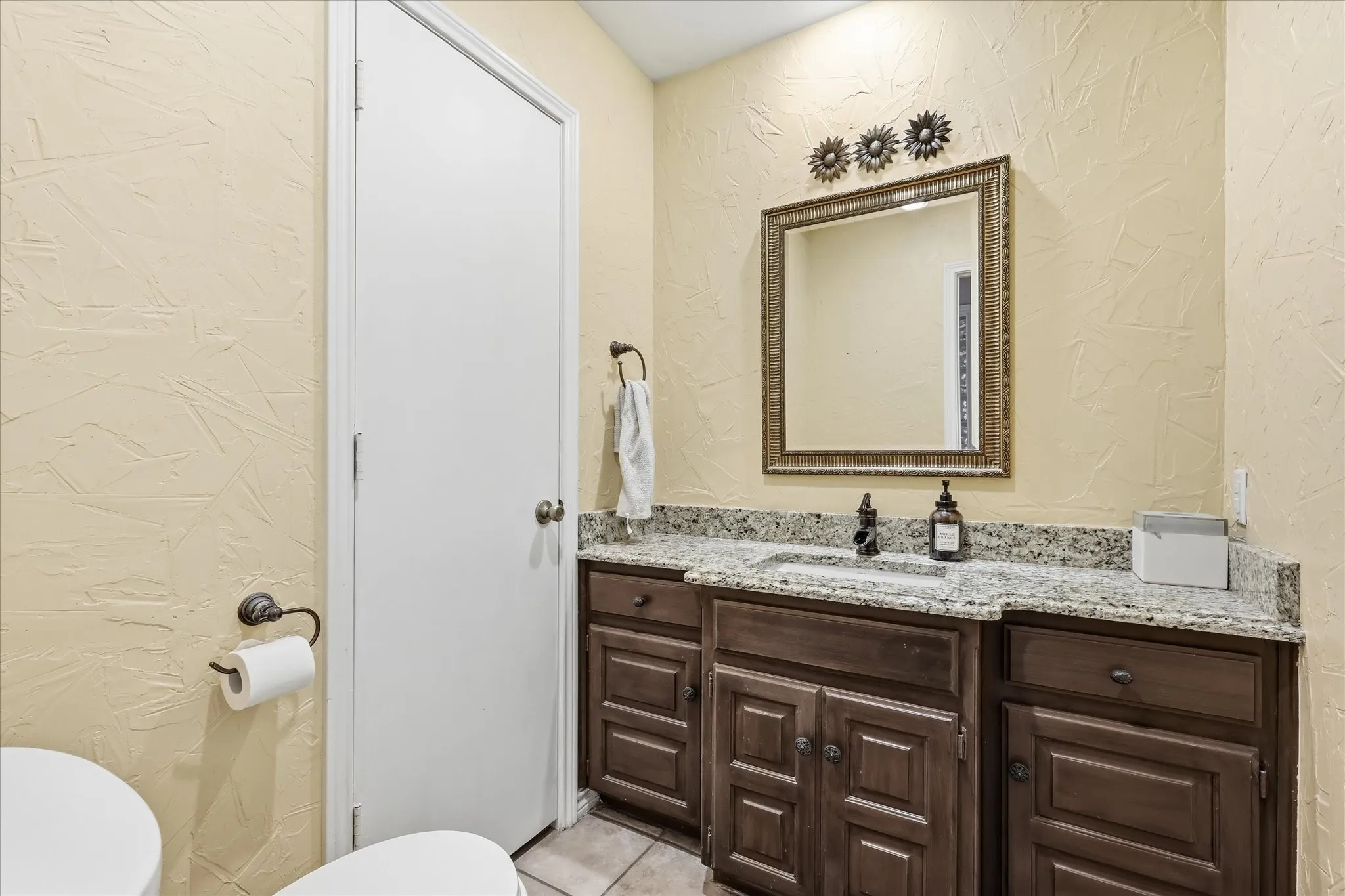 Powder bathroom adjacent to Office