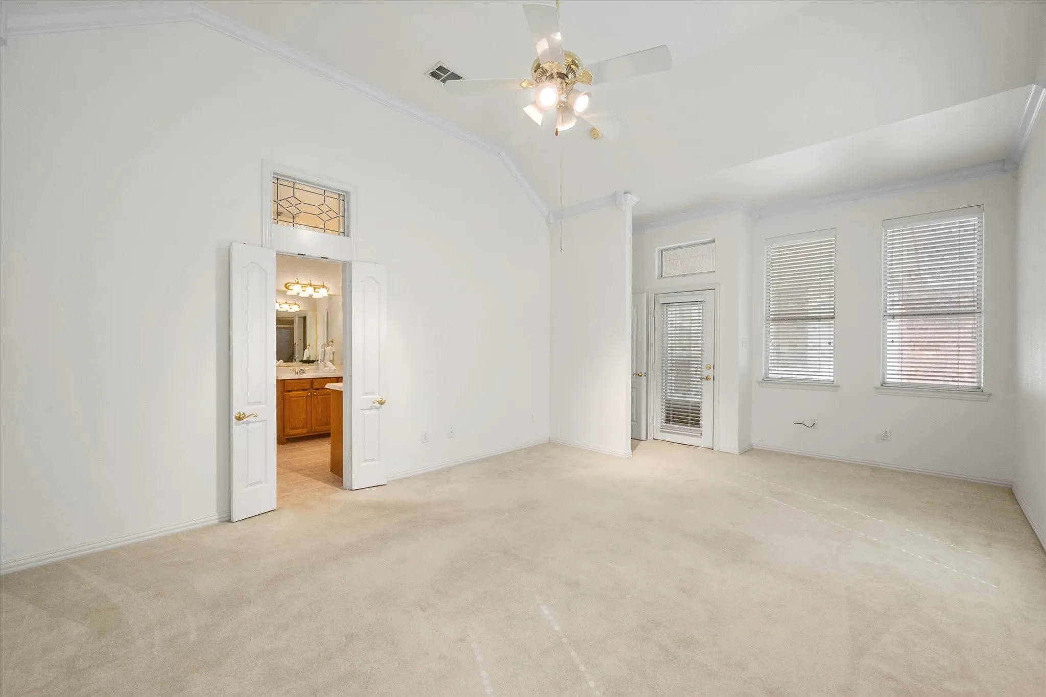 Large oversized bedroom with access door to the backyard