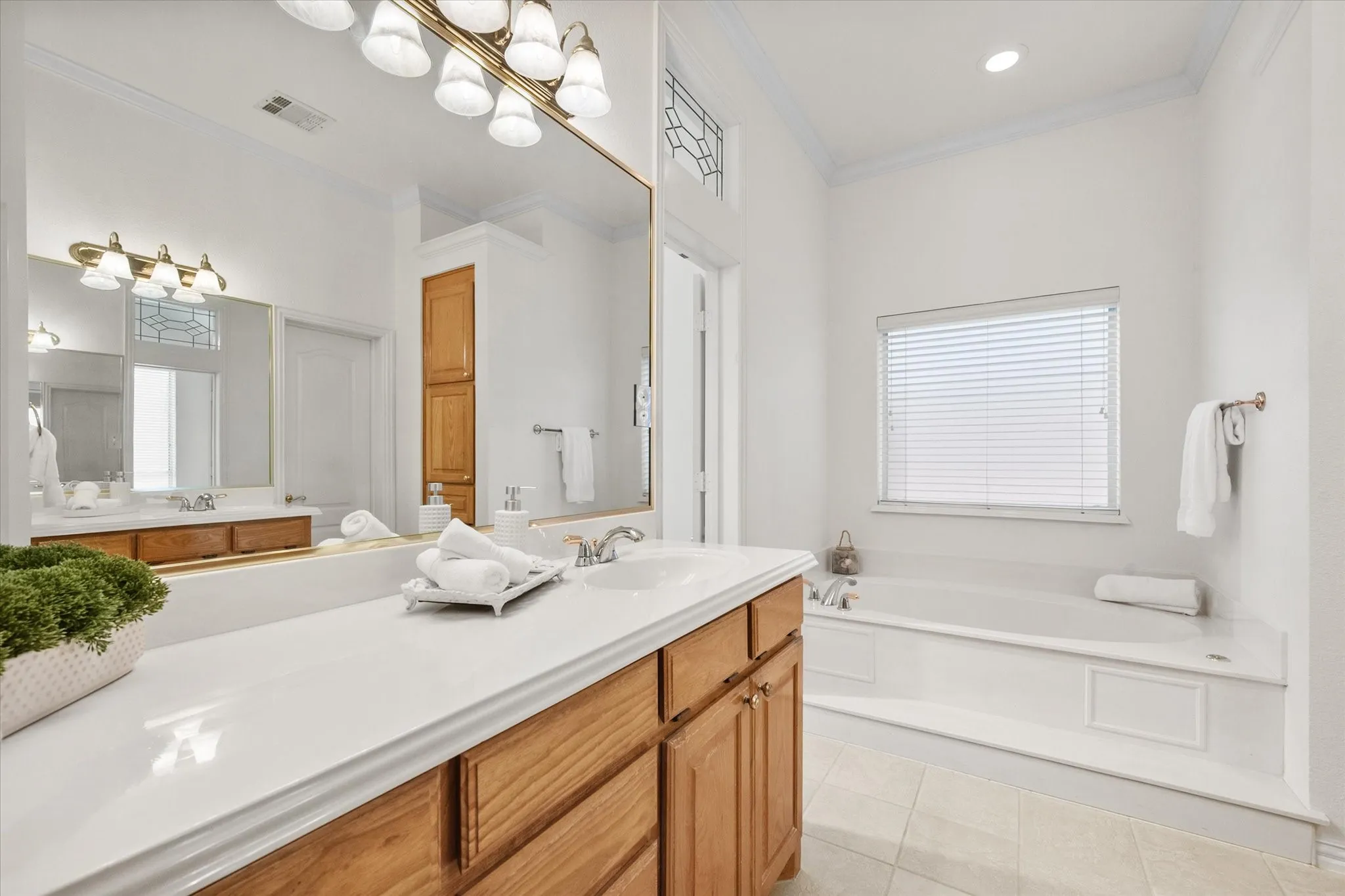 Dual sinks, soaking tub and walk in shower
