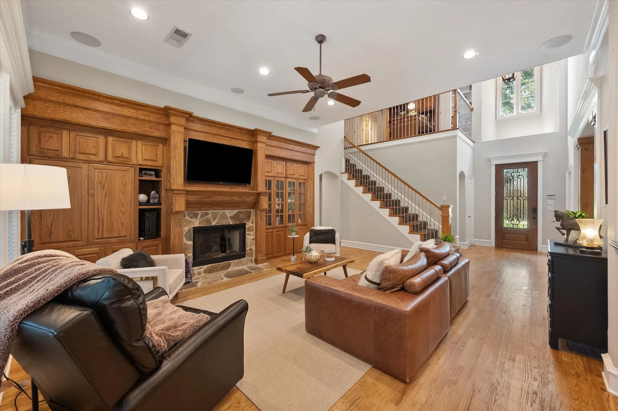 Builtins, wood flooring and stunning fireplace
