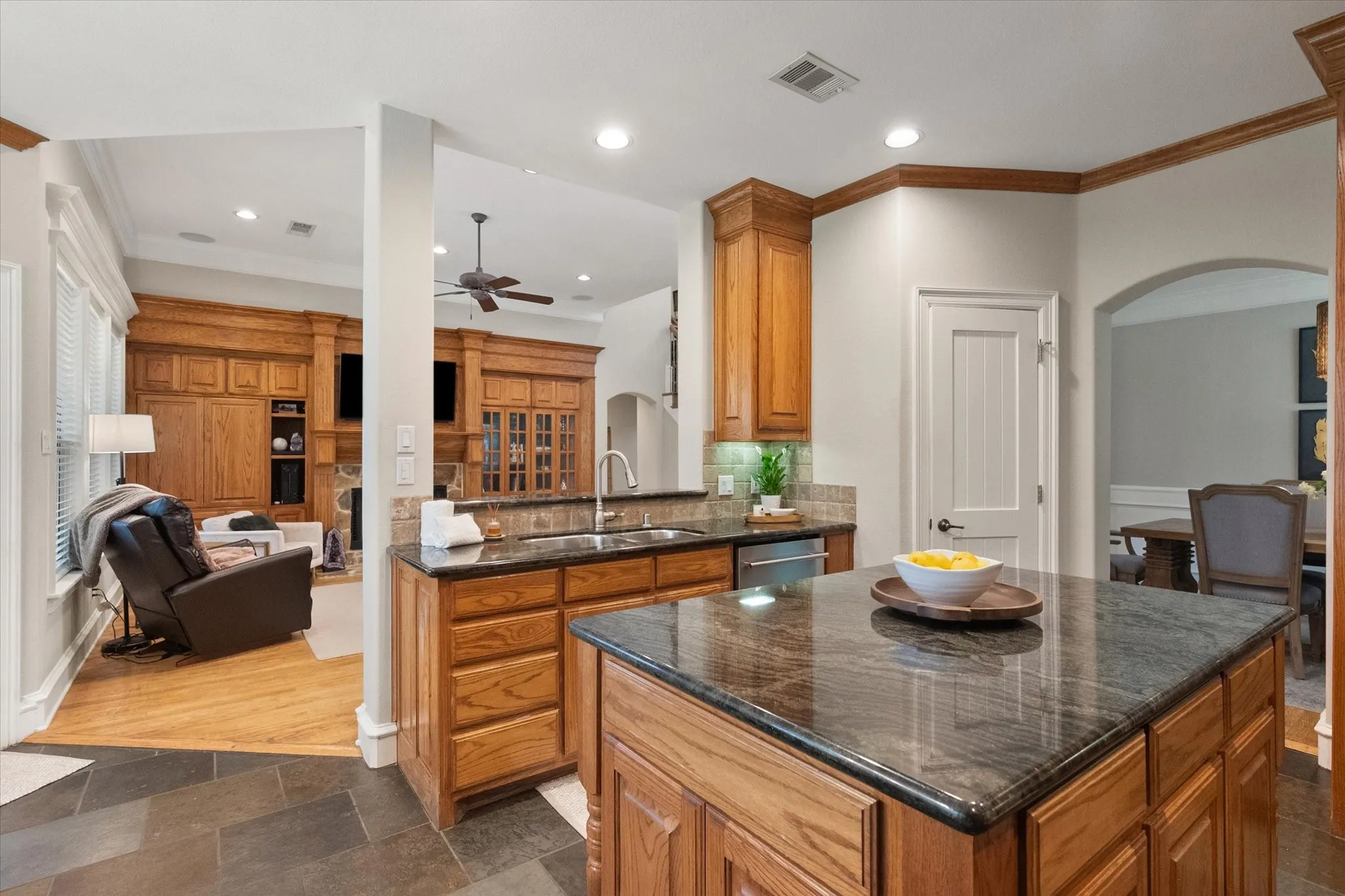 kitchen opens to the living space and overlooks the back yard