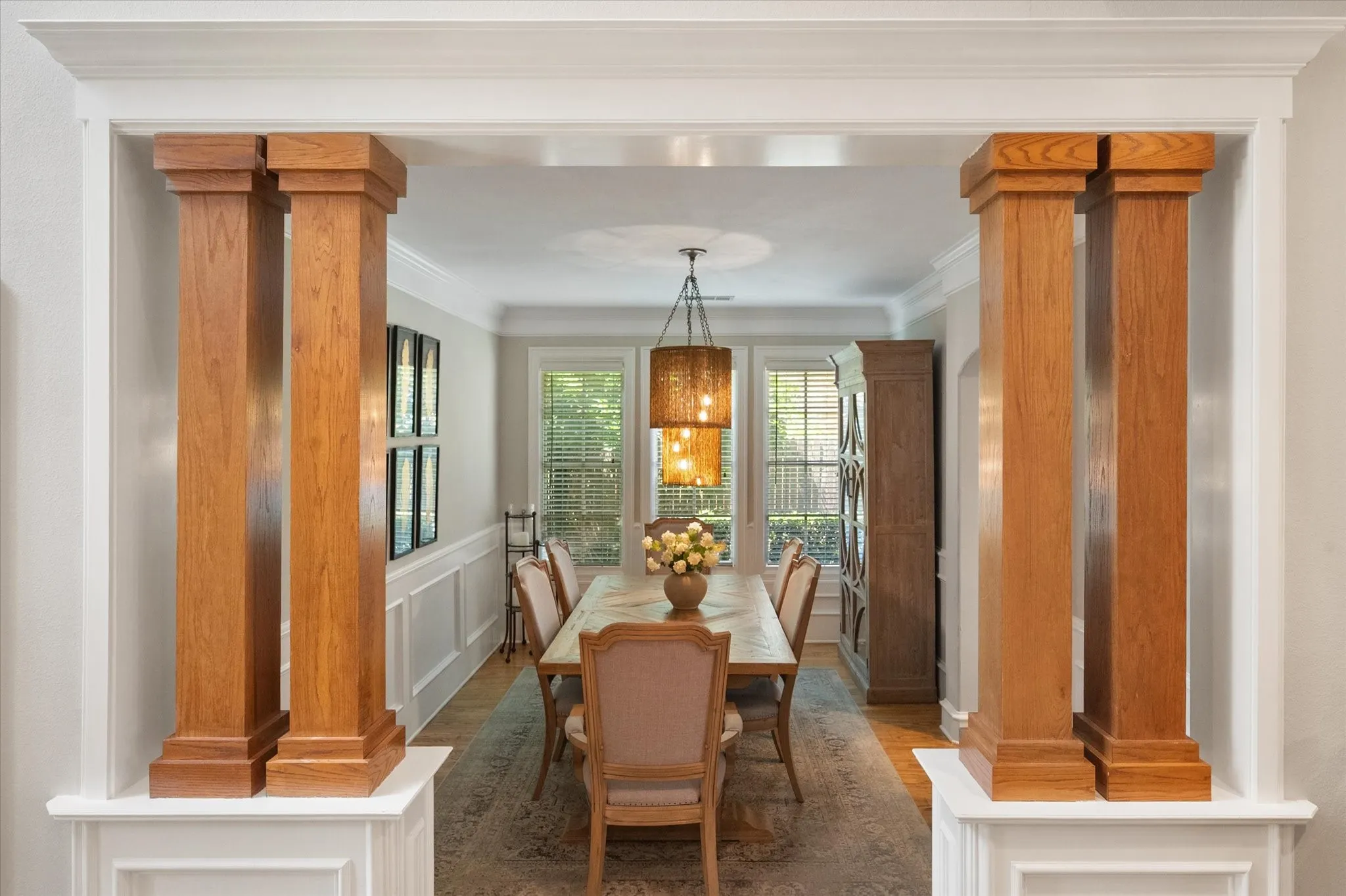 Plenty of space for a large table in the dining room with fabulous light fixture