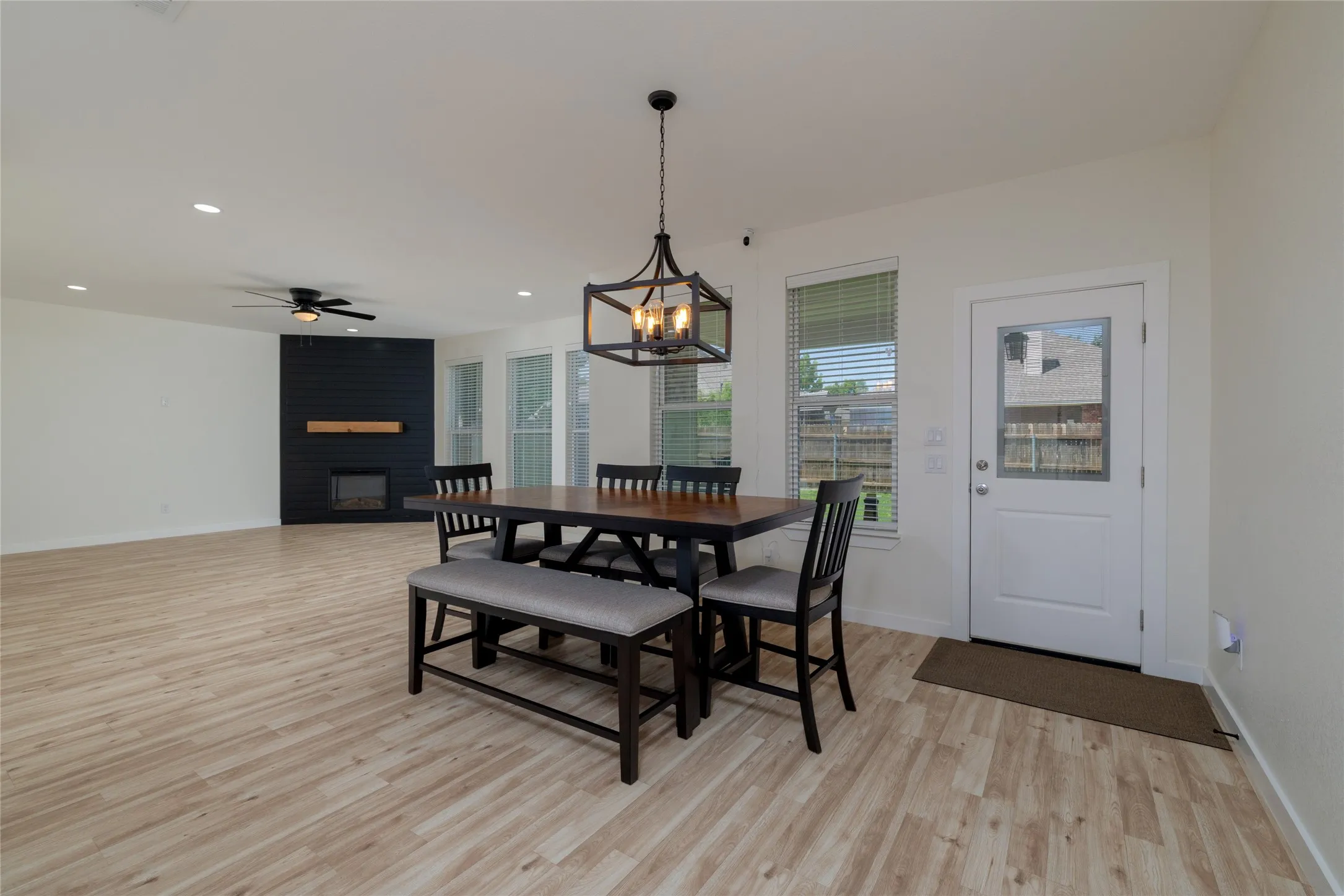 Original Photo AI used - Open-concept living area with wood-finish flooring