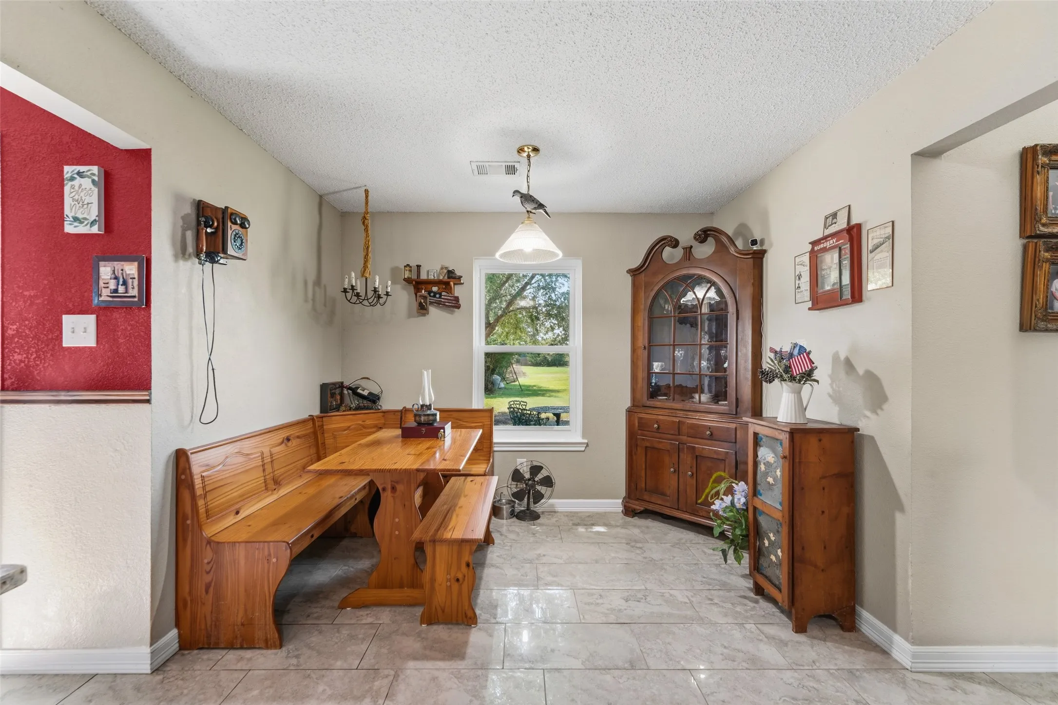 Tiled flooring extending throughout the space