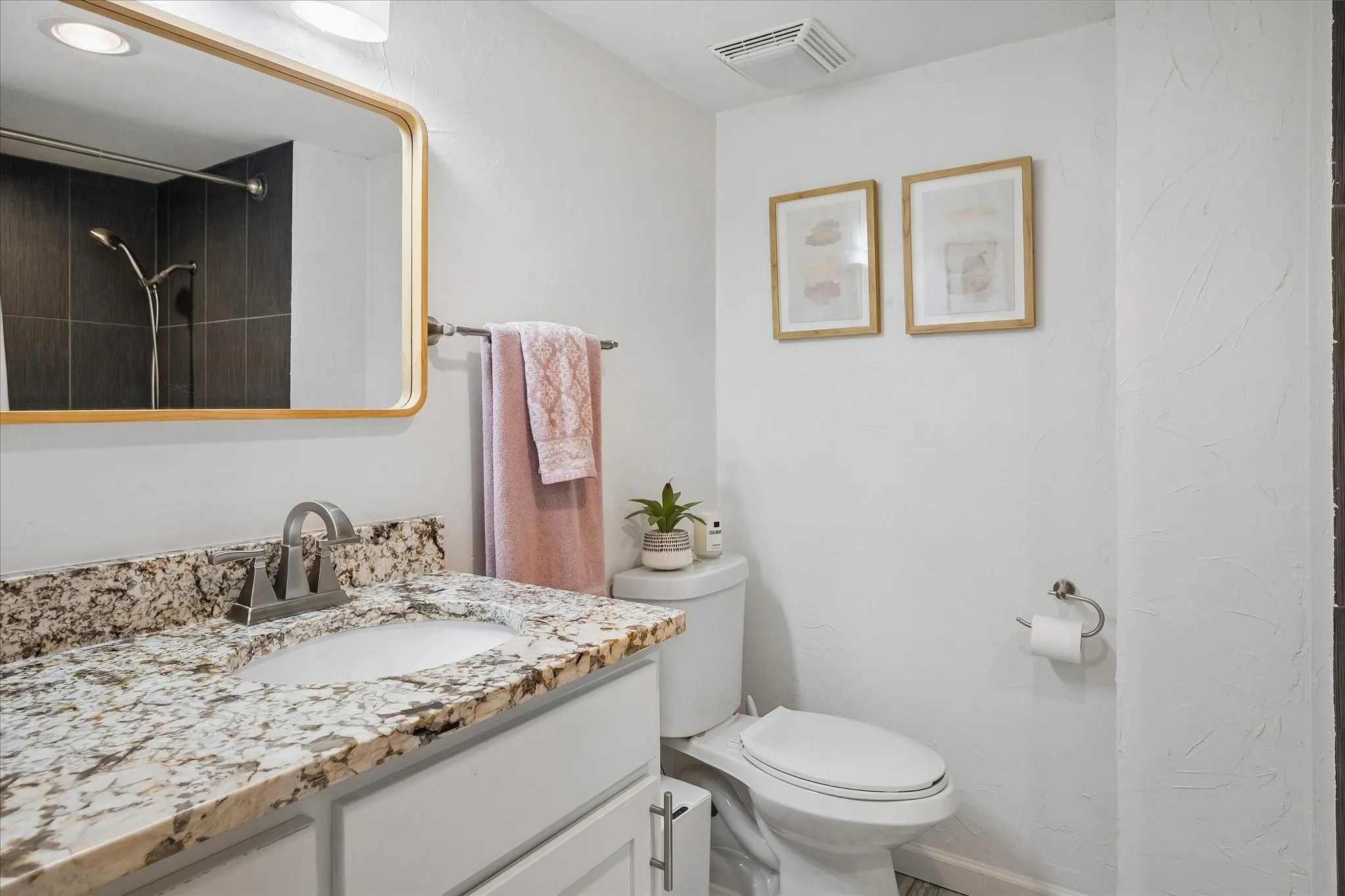 This bathroom is accessed via the hallway