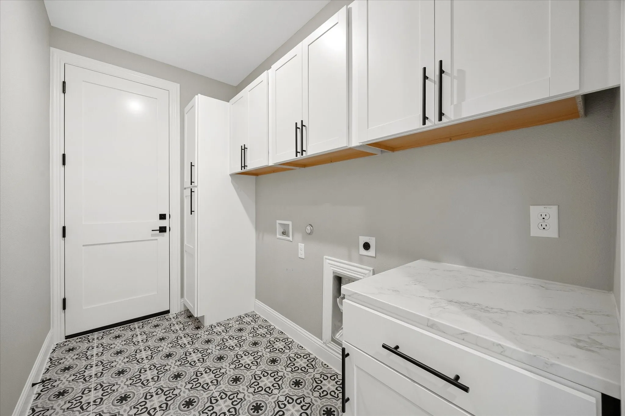 Laundry with Access to 3rd Bay Garage Space
