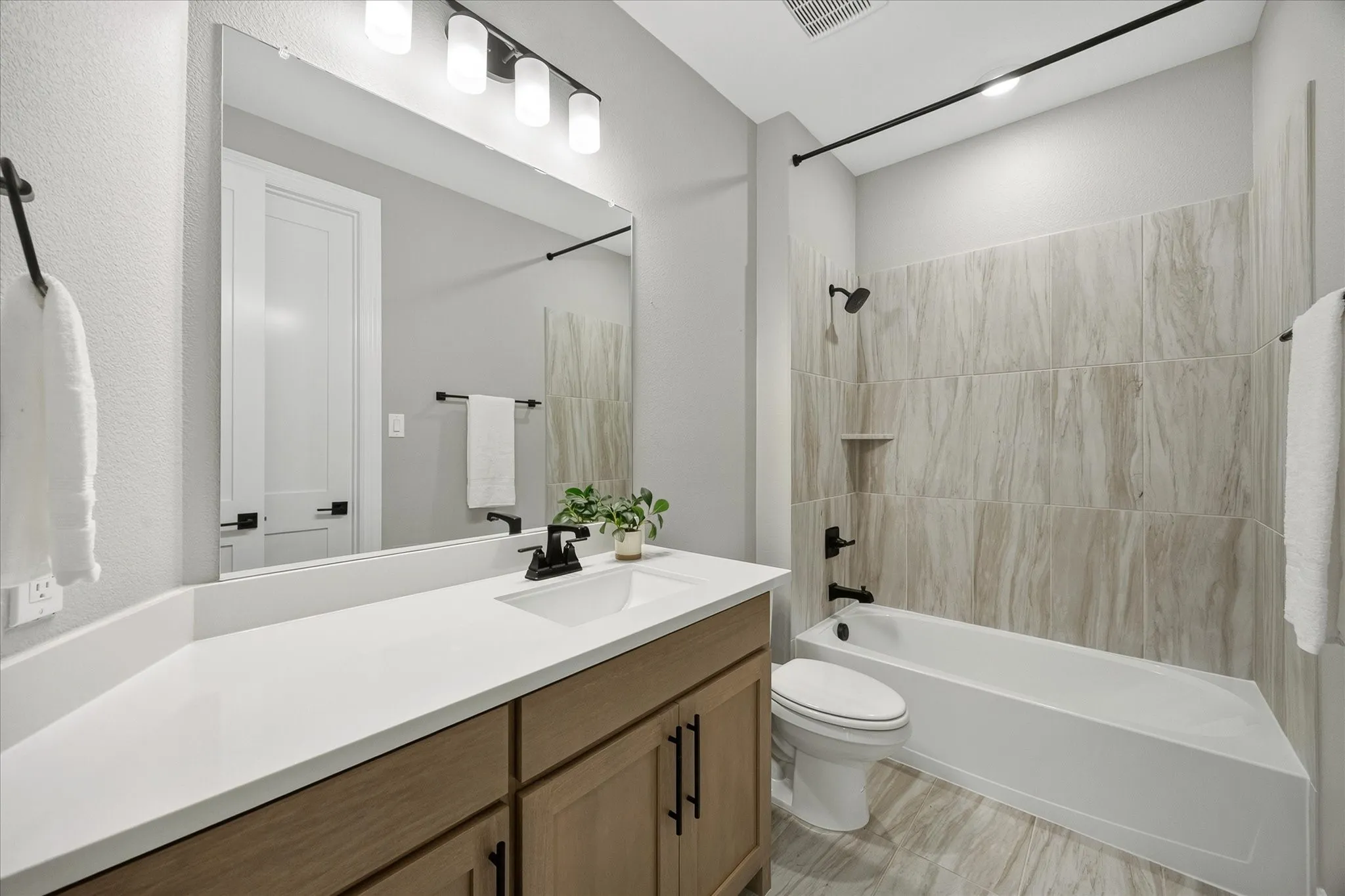 Downstairs 2nd Bath - Ensuite to Bedroom and Hall Access for Guests
