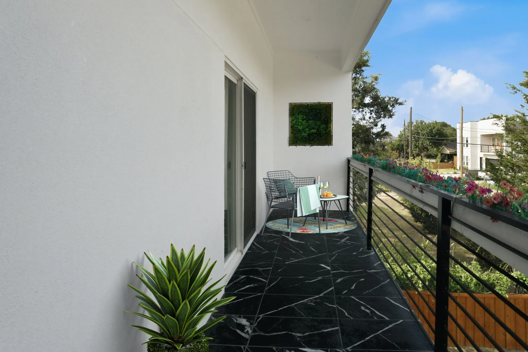 Balcony Access From 2nd Primary Bedroom Which Has Been Virtually Staged.