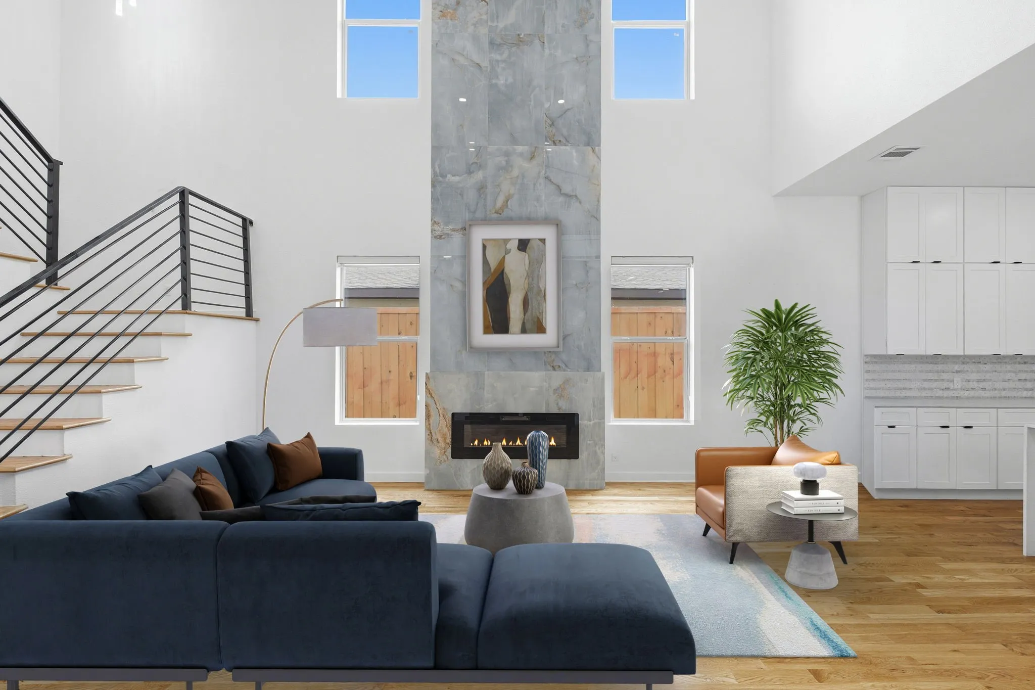 Living Room With A Beautiful Floor To Ceiling Fireplace Which Has Been Virtually Staged.