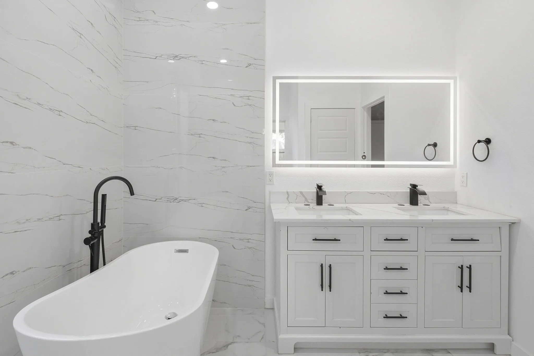 1st Floor Primary Bedroom Ensuite Showcasing Free Standing Tub.