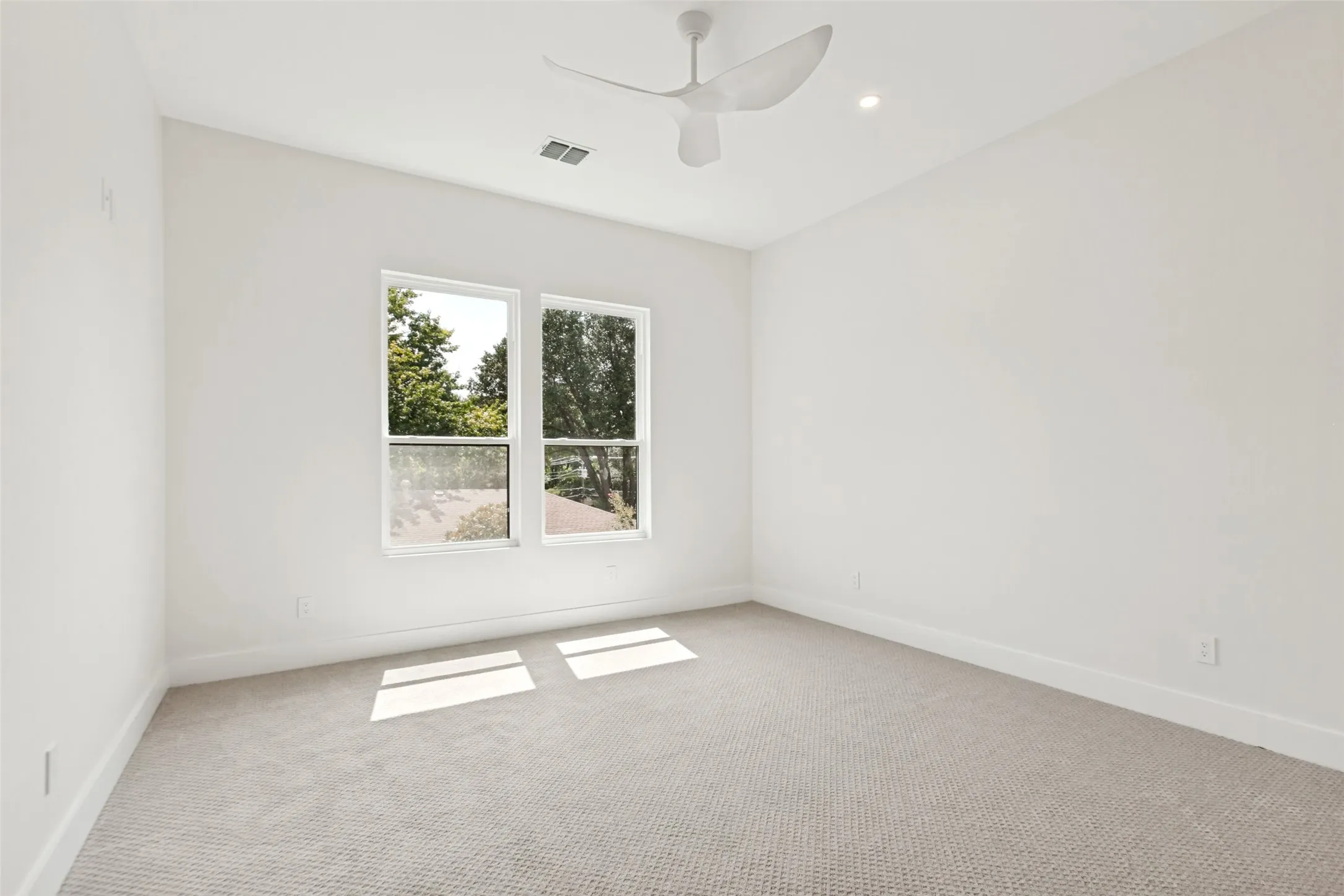 Bedroom #5 with modern designer fan.