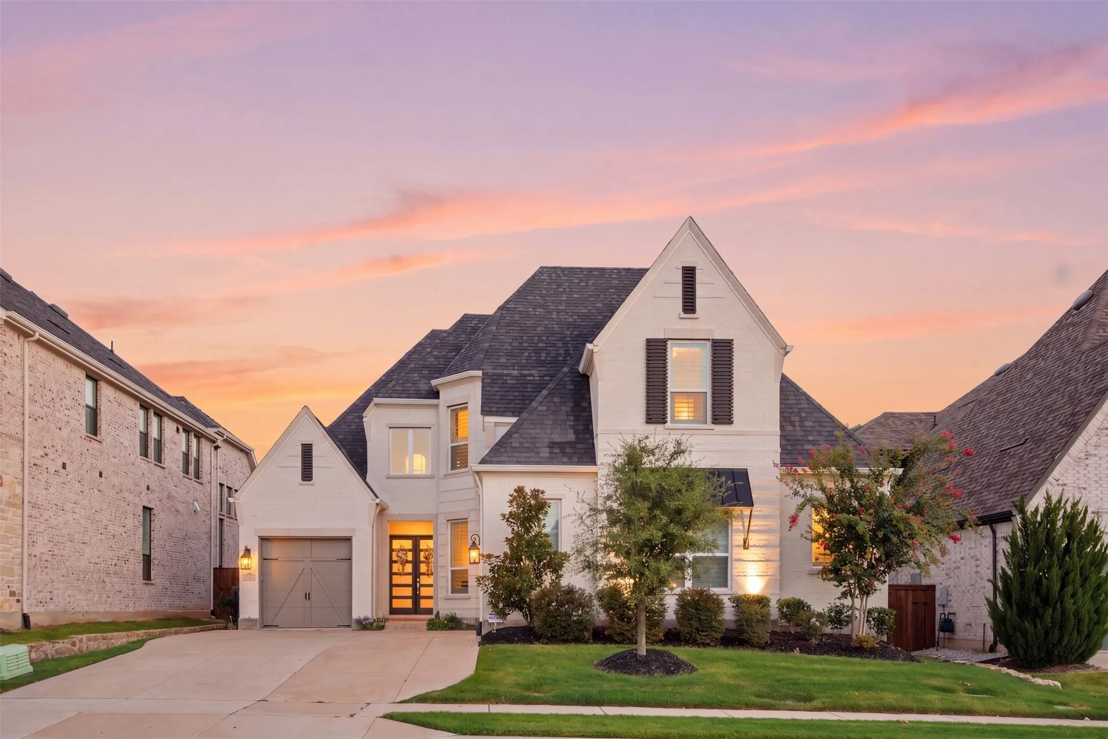 Beautiful, custom Highland Home with J-swing extended driveway and stunning curb appeal.