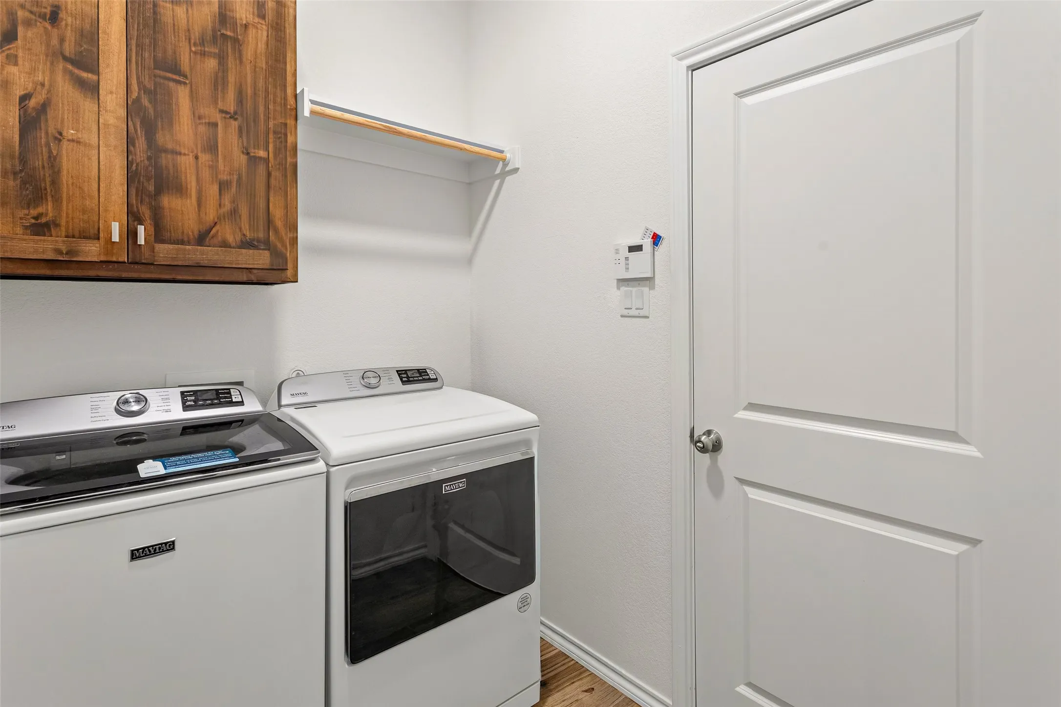 Storage & Hanging Space In The Utility Room