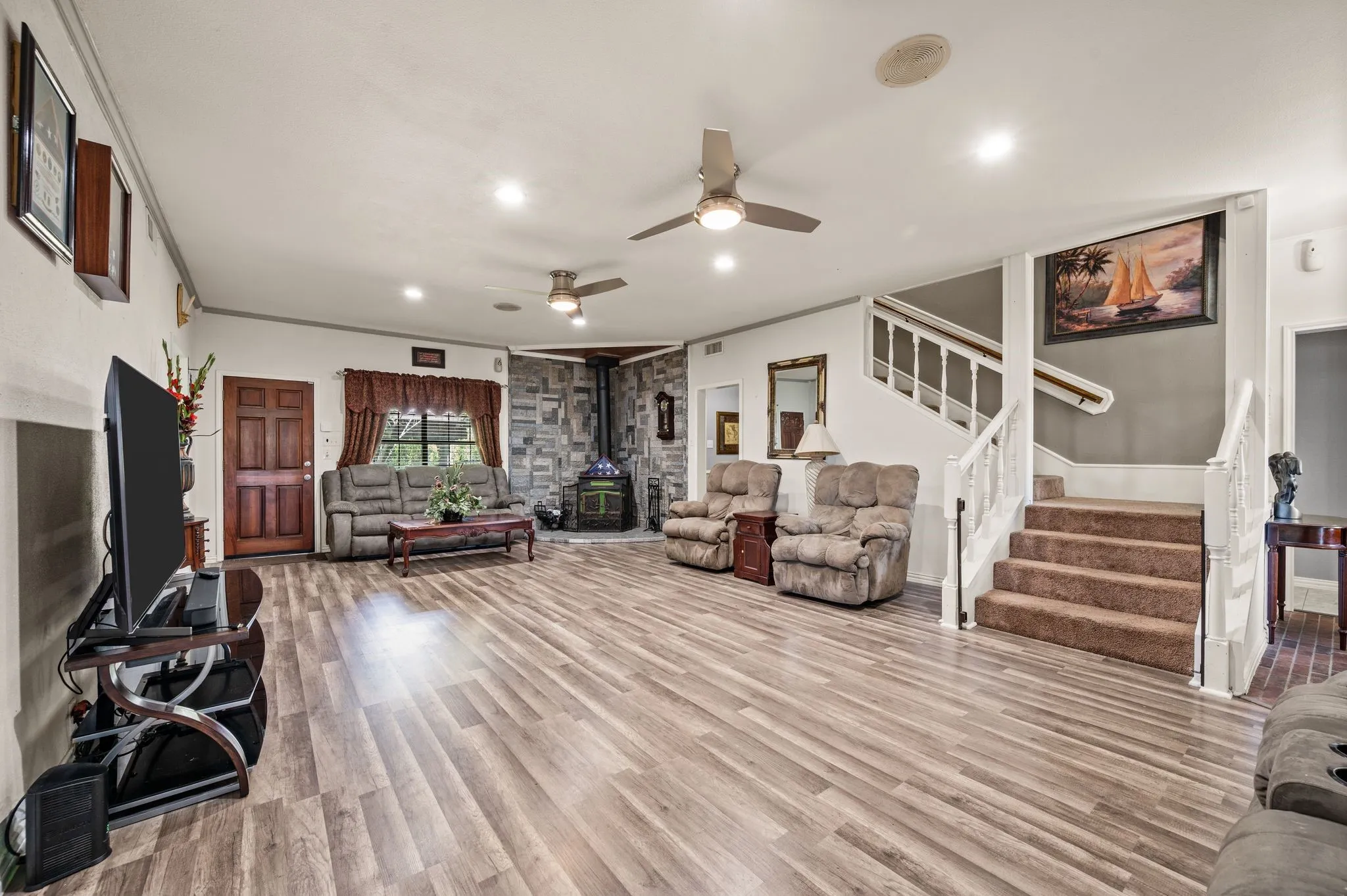Large living room with wood stove