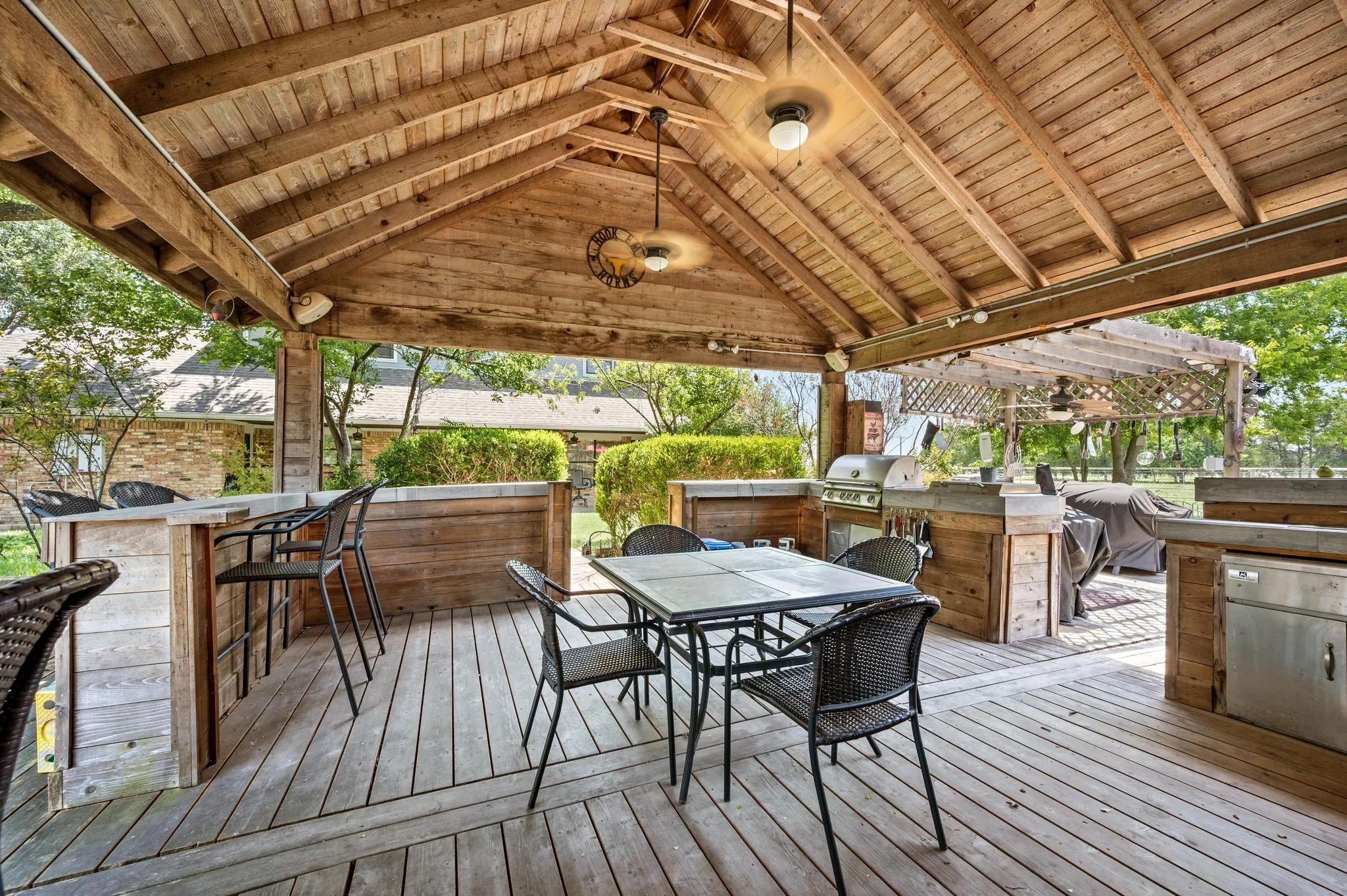 Large covered deck with outdoor kitchen