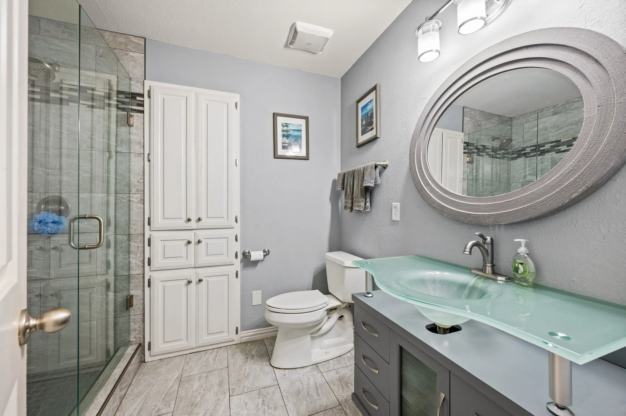 Updated downstairs full bath with walk in shower