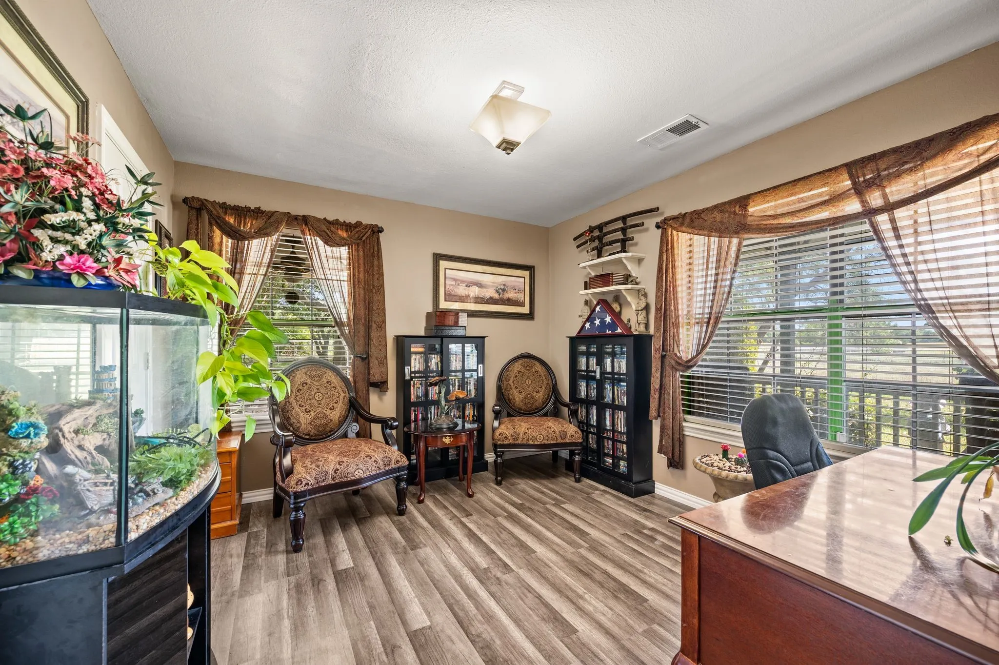 First level bedroom or office space with large walk in closet