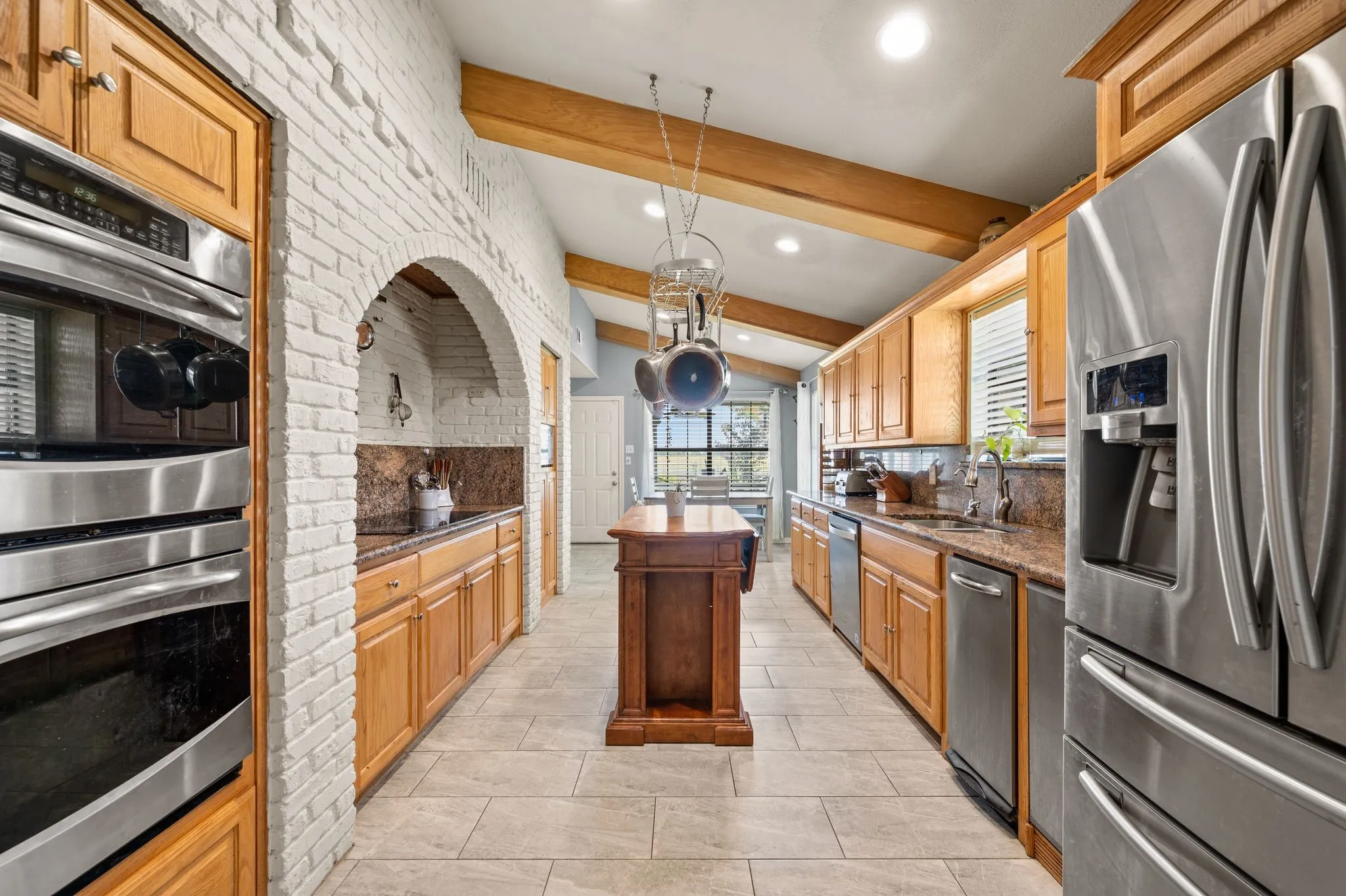 Updated kitchen with granite and stainless appliances