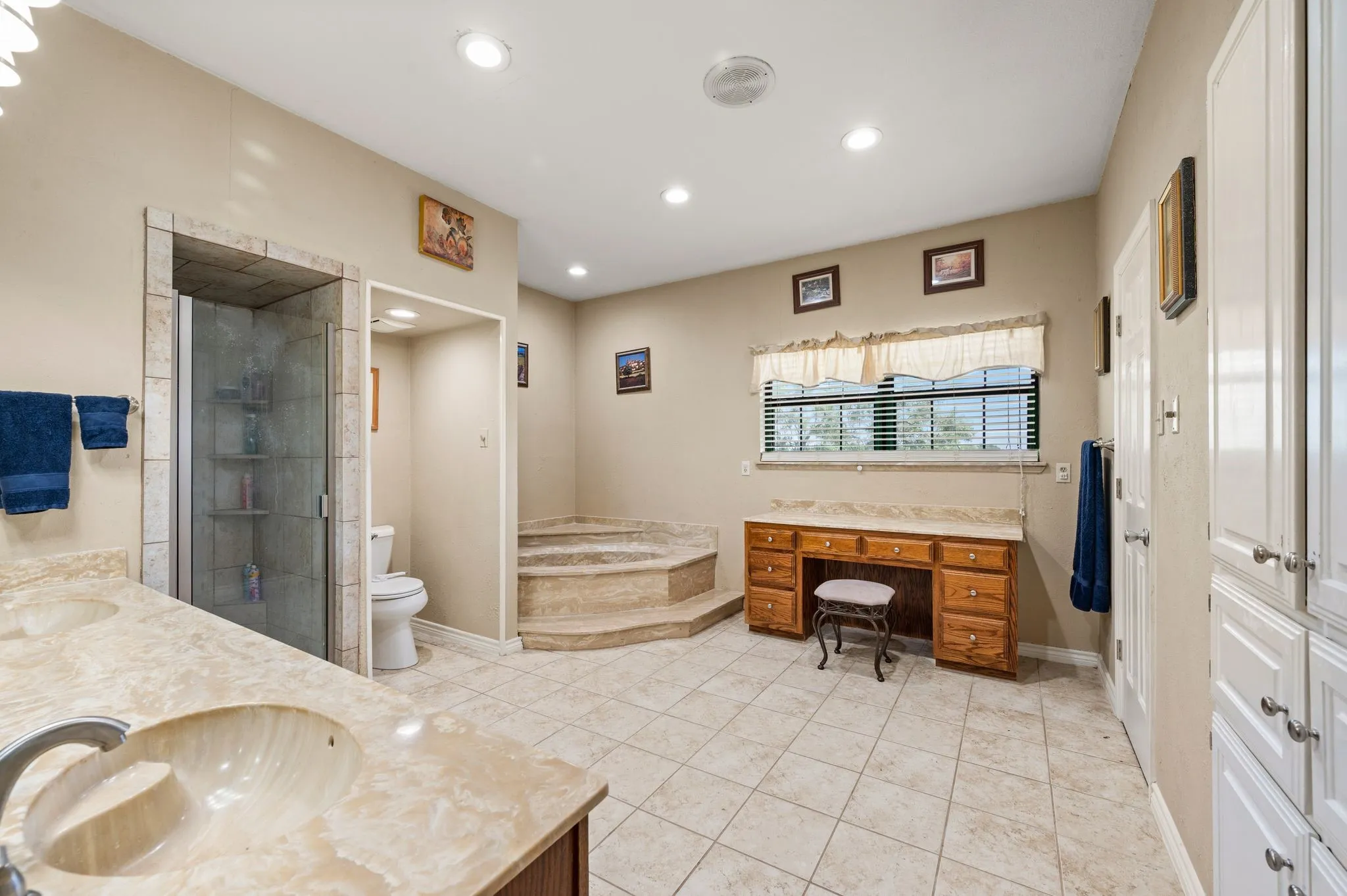Primary Bath with split vanities, garden tub and separate shower