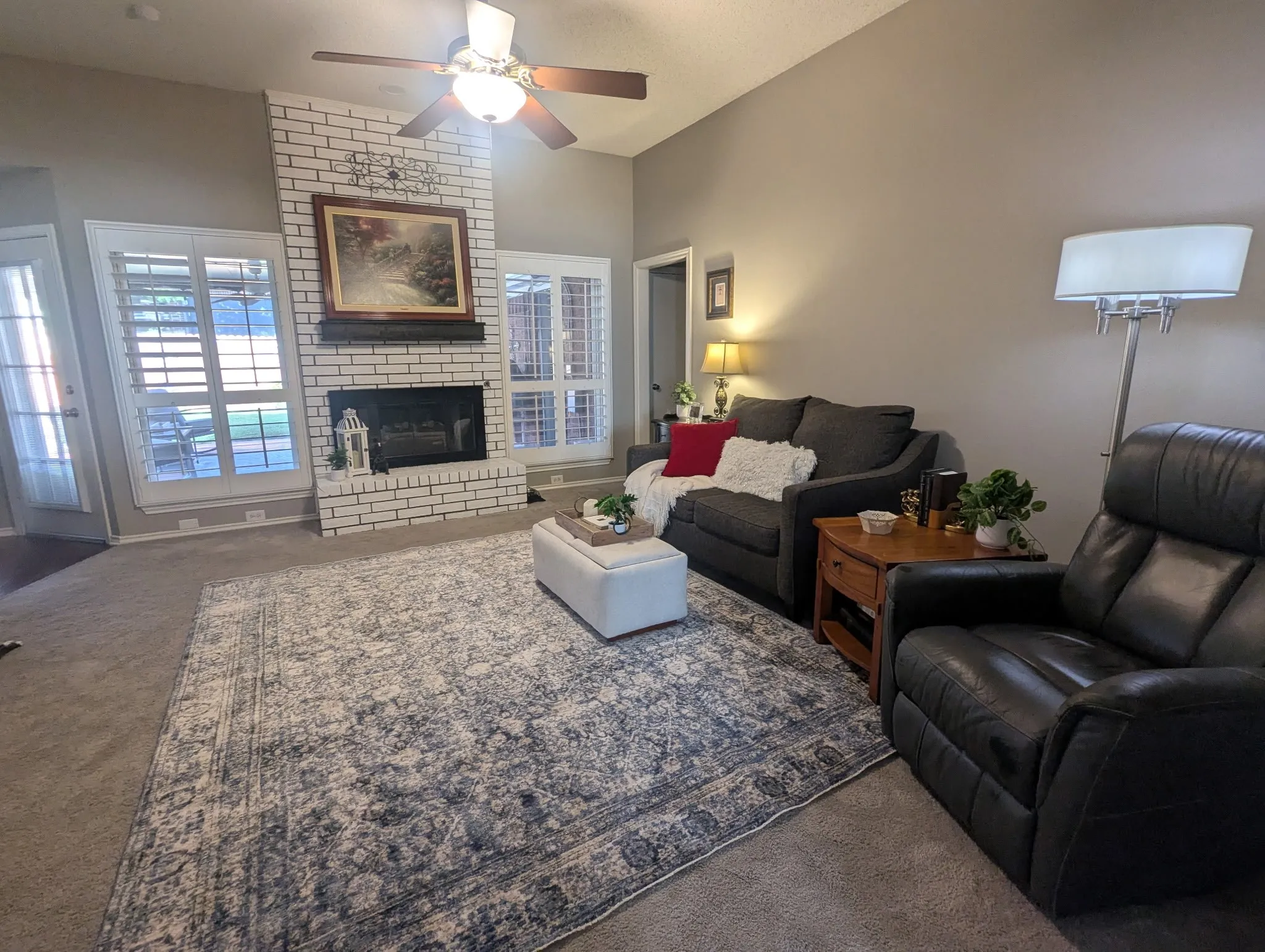 Den with Gas Fireplace Next to Kitchen