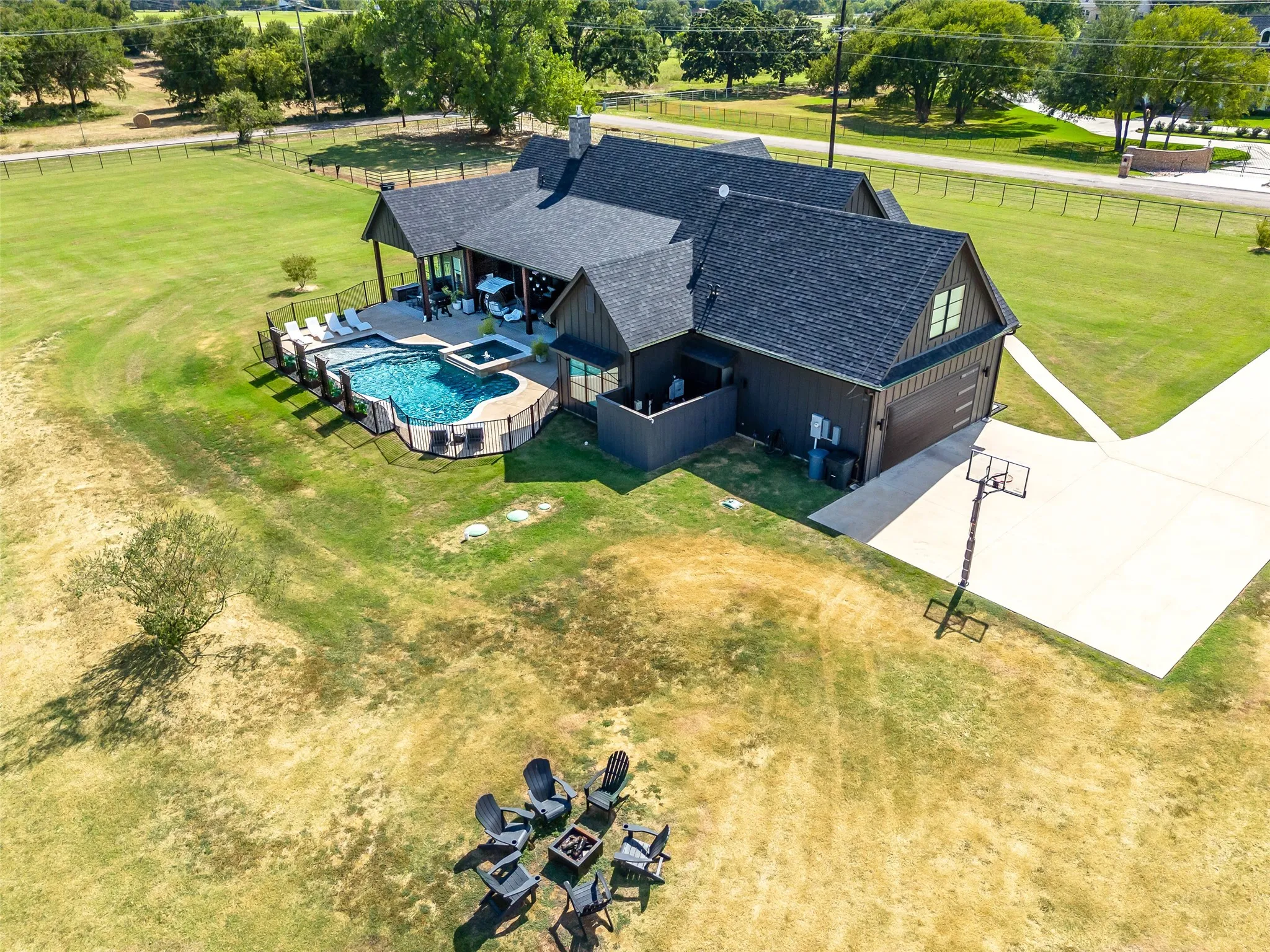 BACK OF MAIN HOME WITH INGROUND POOL/SPA