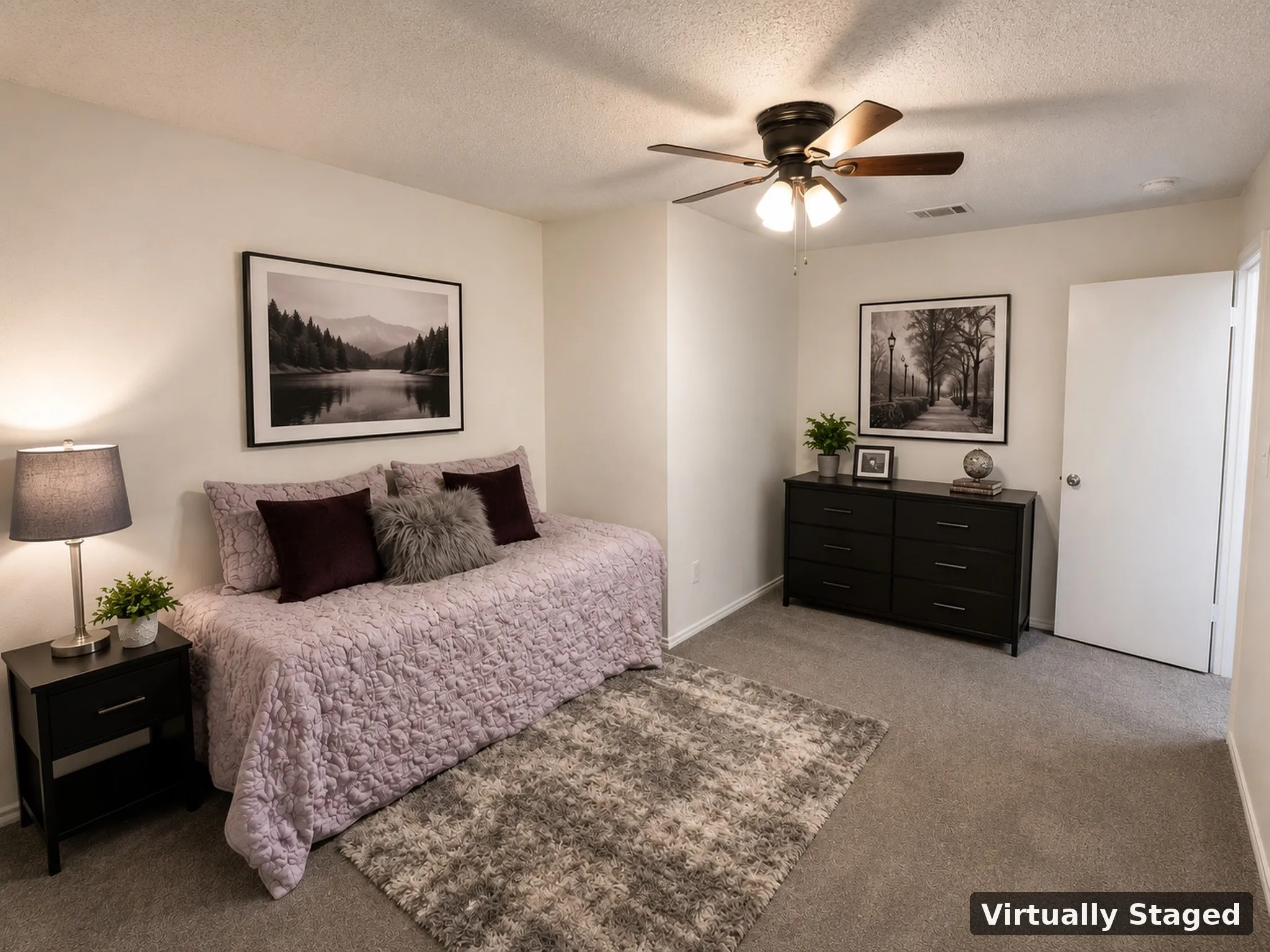 Neutral-toned walls complement the gray carpeting